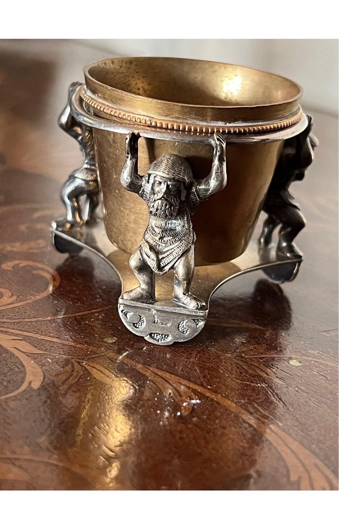 Thomas Latham & Ernest Morton, Birmingham, Mid 19th Century, the tri-form base mounted with three trolls or dwarves and supporting detachable gilt well!.