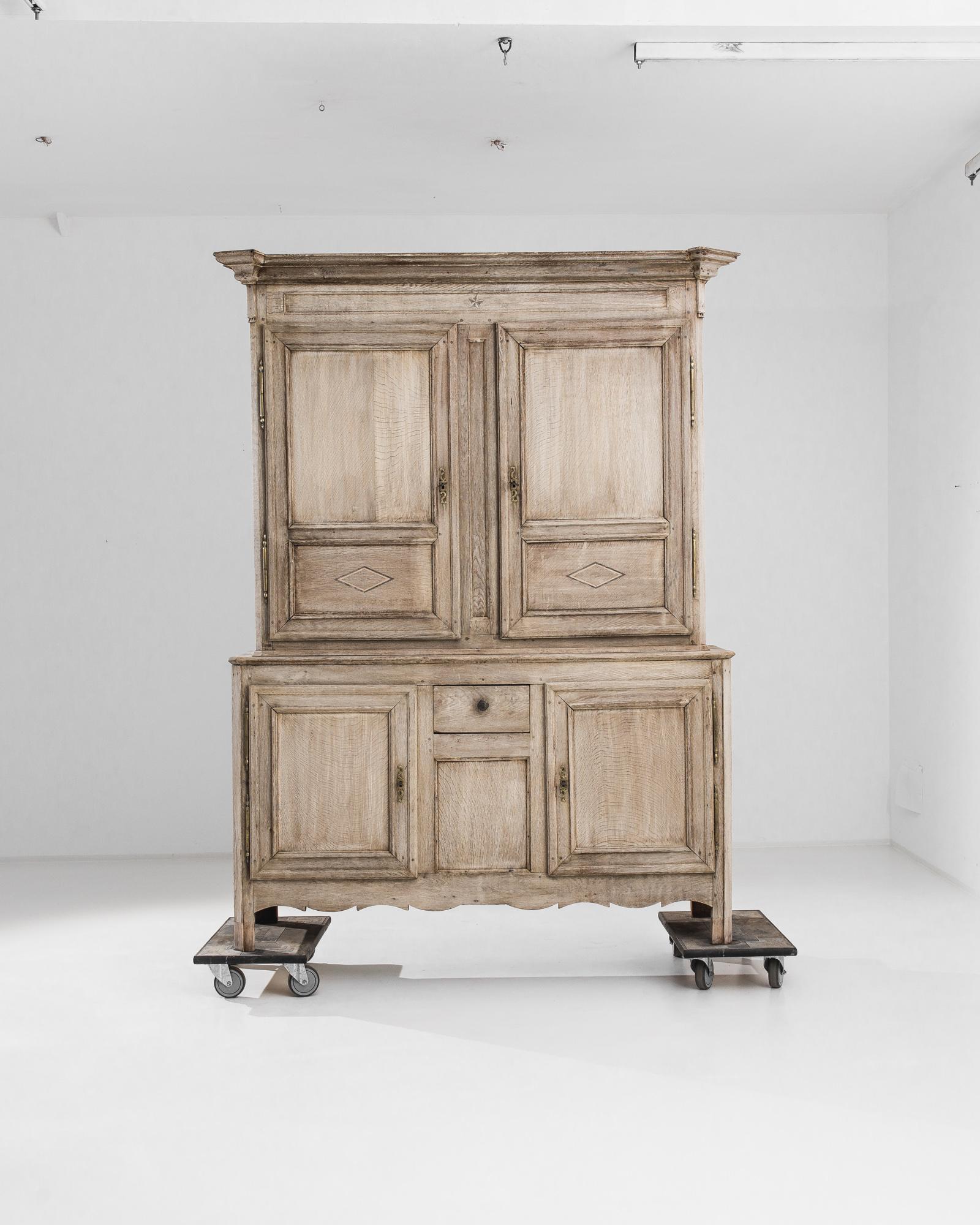 Step into the refined elegance of the 19th century with this 1860s French Bleached Oak Cabinet. This stunning piece features the classic lines and stately form of French provincial design, with a bleached oak finish that brings a light, airy feel to