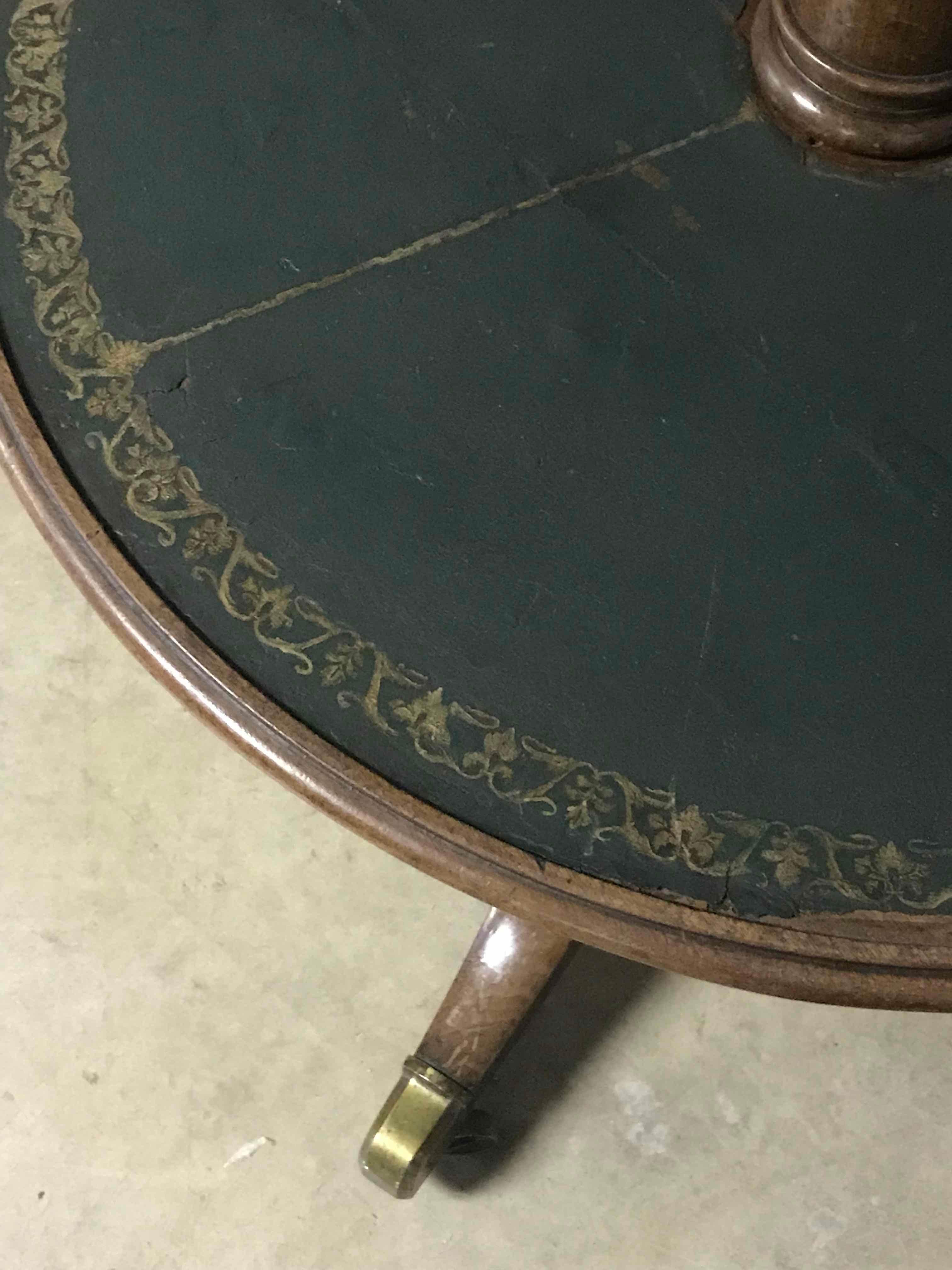 1860s French two-tier round table with leather top. 