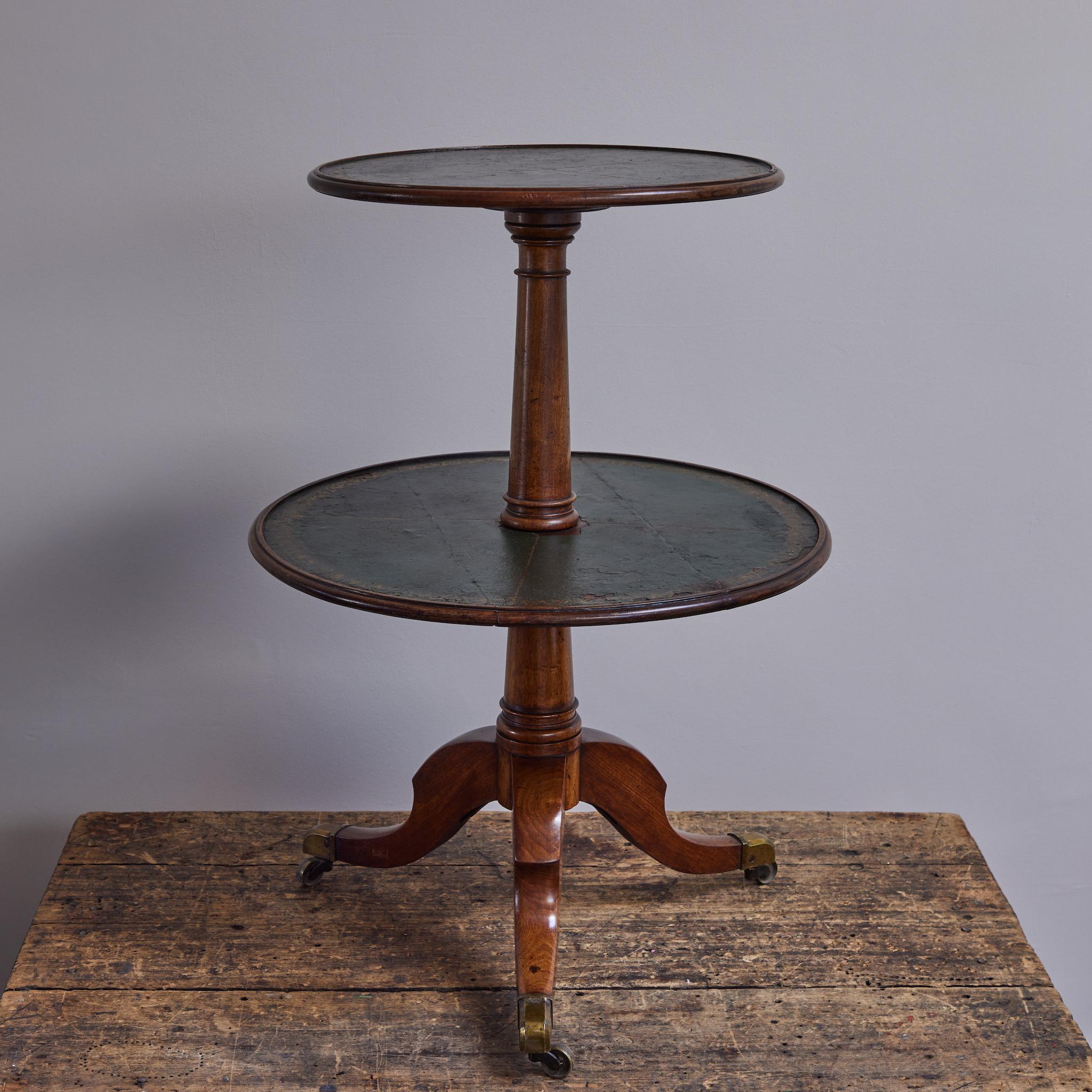 is a french side table with a circular top.