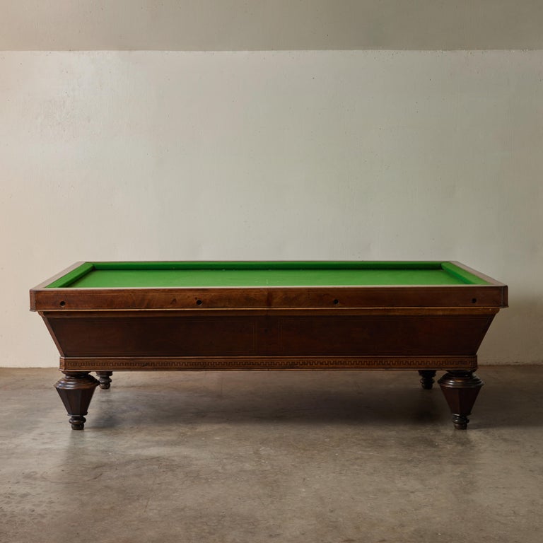 Gorgeous original 19th-century Carom billiards table in the 'pocketless' style, originally from the Piedmonte region of Italy.  Constructed of rich mahogany with exceptional parquetry inlay and mounted on tapering conical turnip-style legs, the