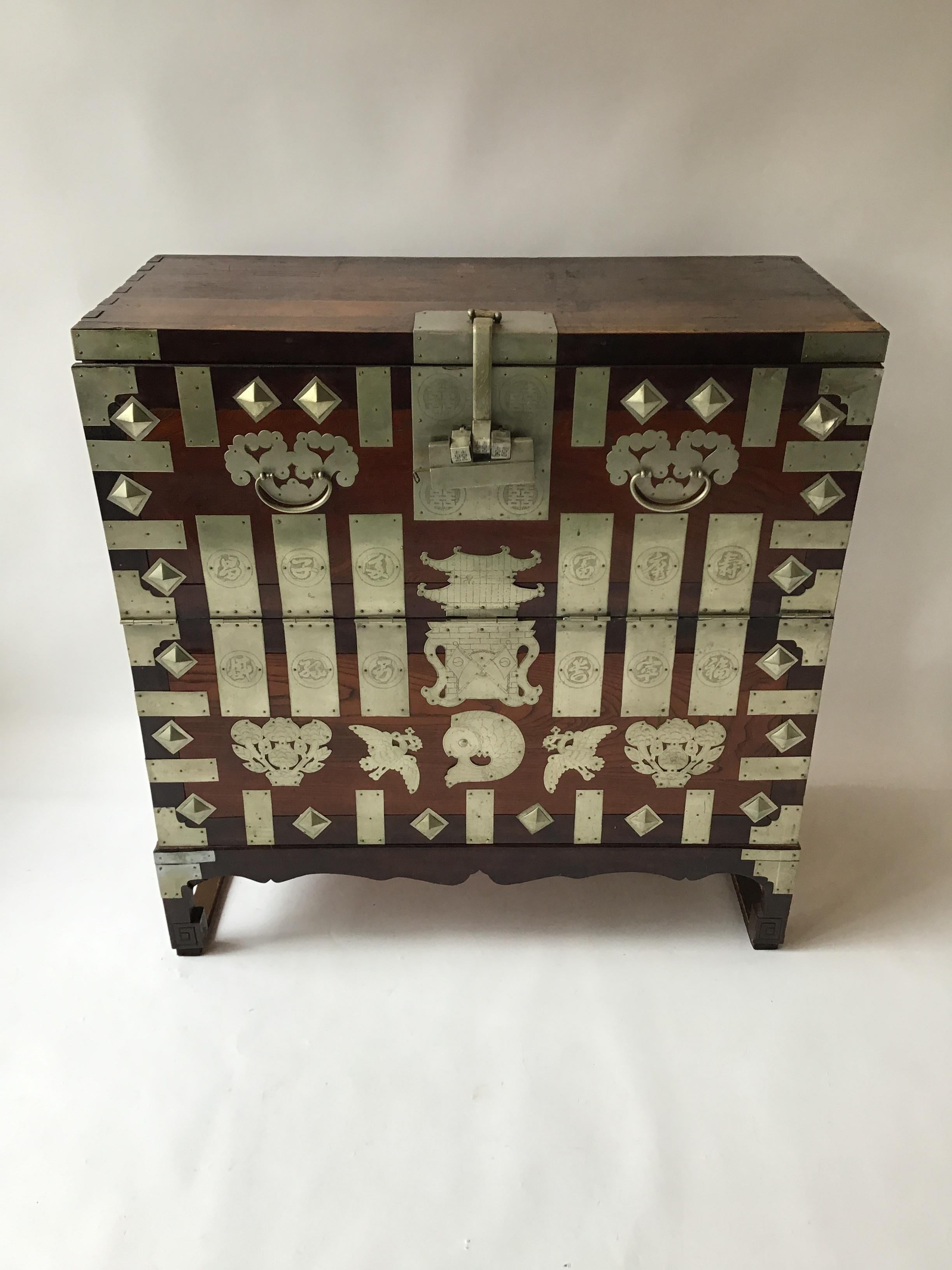 1860s Korean chest, adorned with fish, birds and flowers. 2 shelves.
