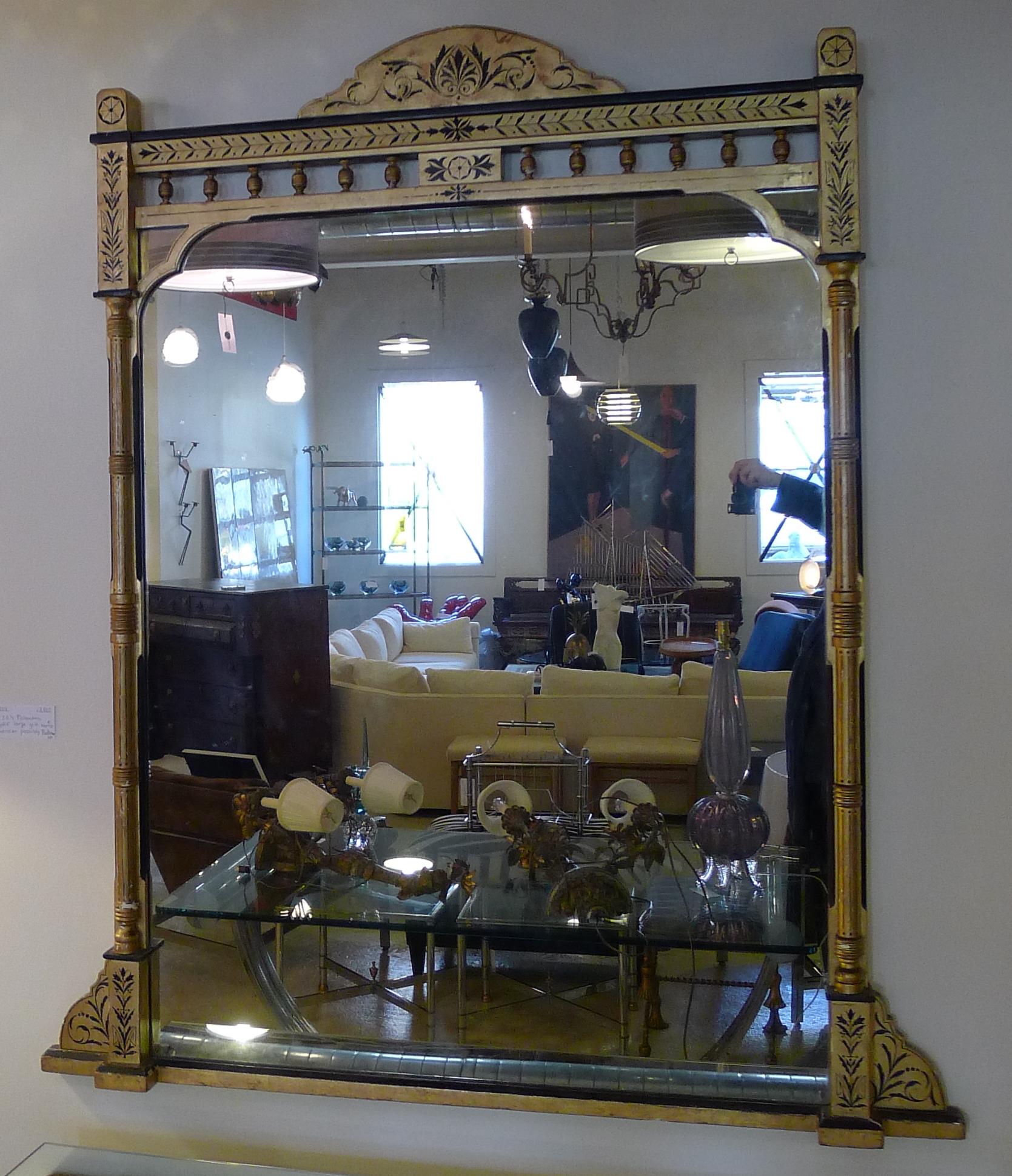 1860s American giltwood overmantel tall mirror. Original gilt and black classical painted decoration with palmetto detailing. Original glass.