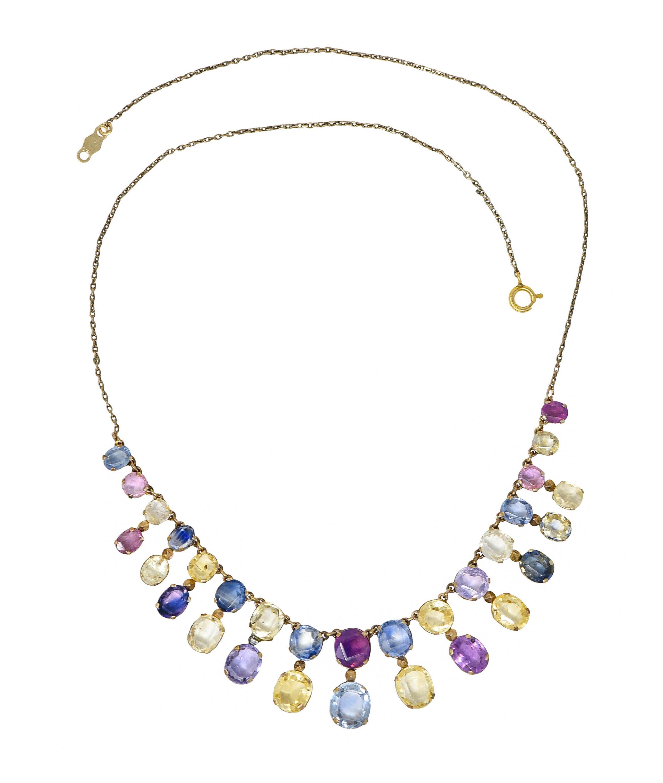 Cable chain necklace features oval, round, and cushion cut sapphires as fringe droplets

Transparent to translucent with pastel to medium light color

Pink, yellow, blue, and lavender with some exhibiting bi-color saturation

Weighing in total