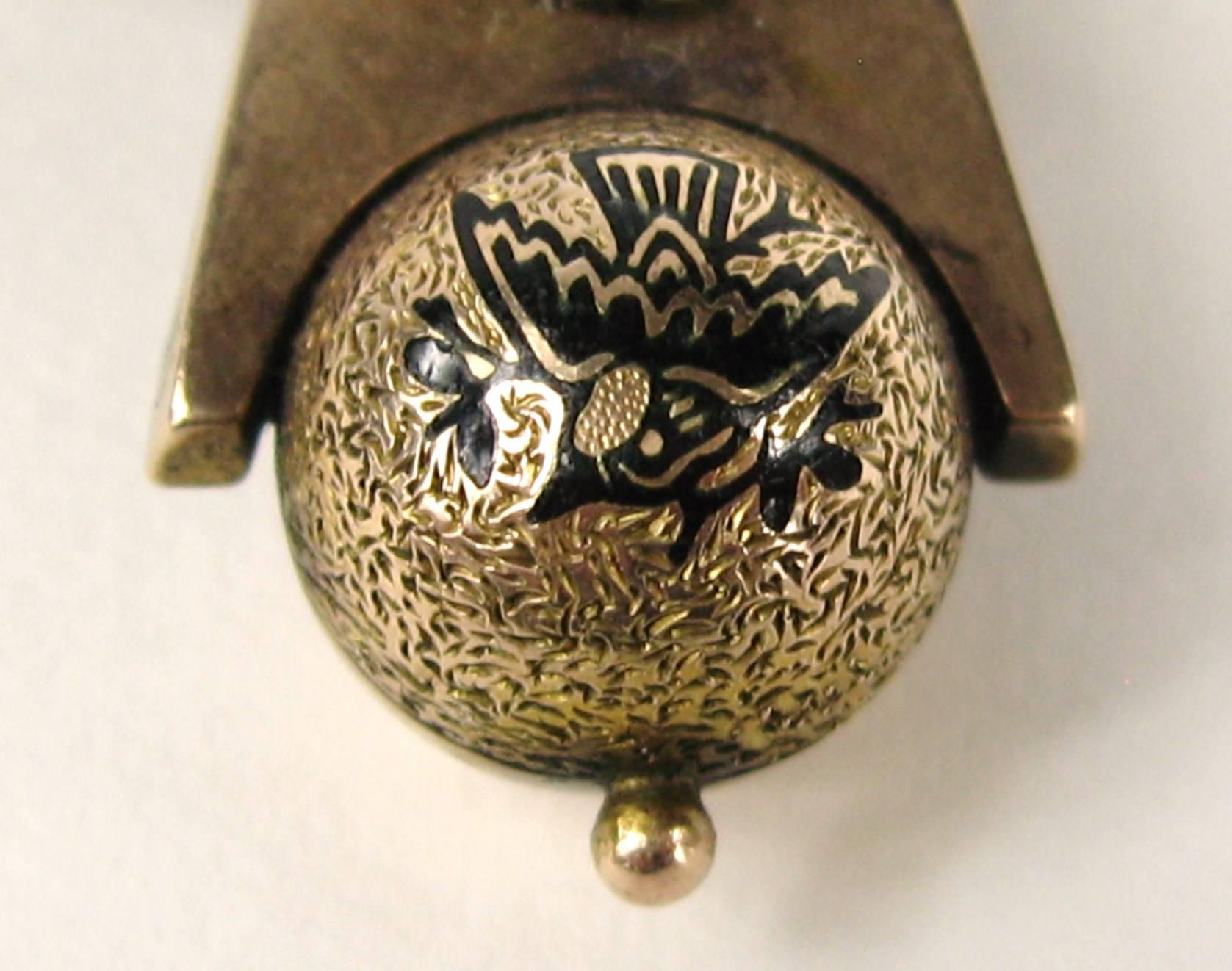Stunning Victorian Gold Brooch or Pendent
Seed pearl detailing 
Fan Design with dangle ball etched in black 
Measuring 
1.62 in x 1.70 in
Any questions please call, email or hit request more information 