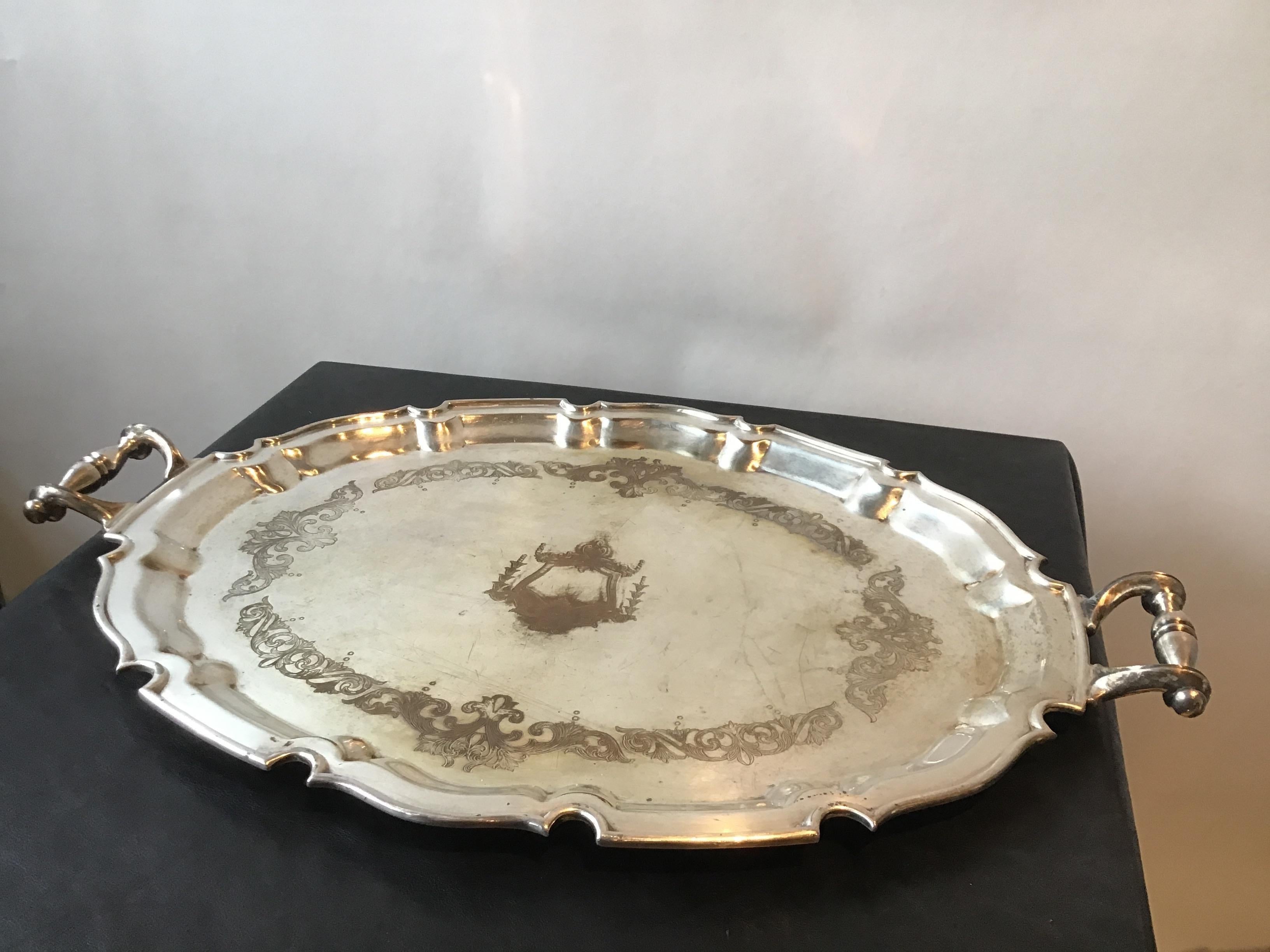 1862 silver plate serving tray. Silver plate worn away in areas.