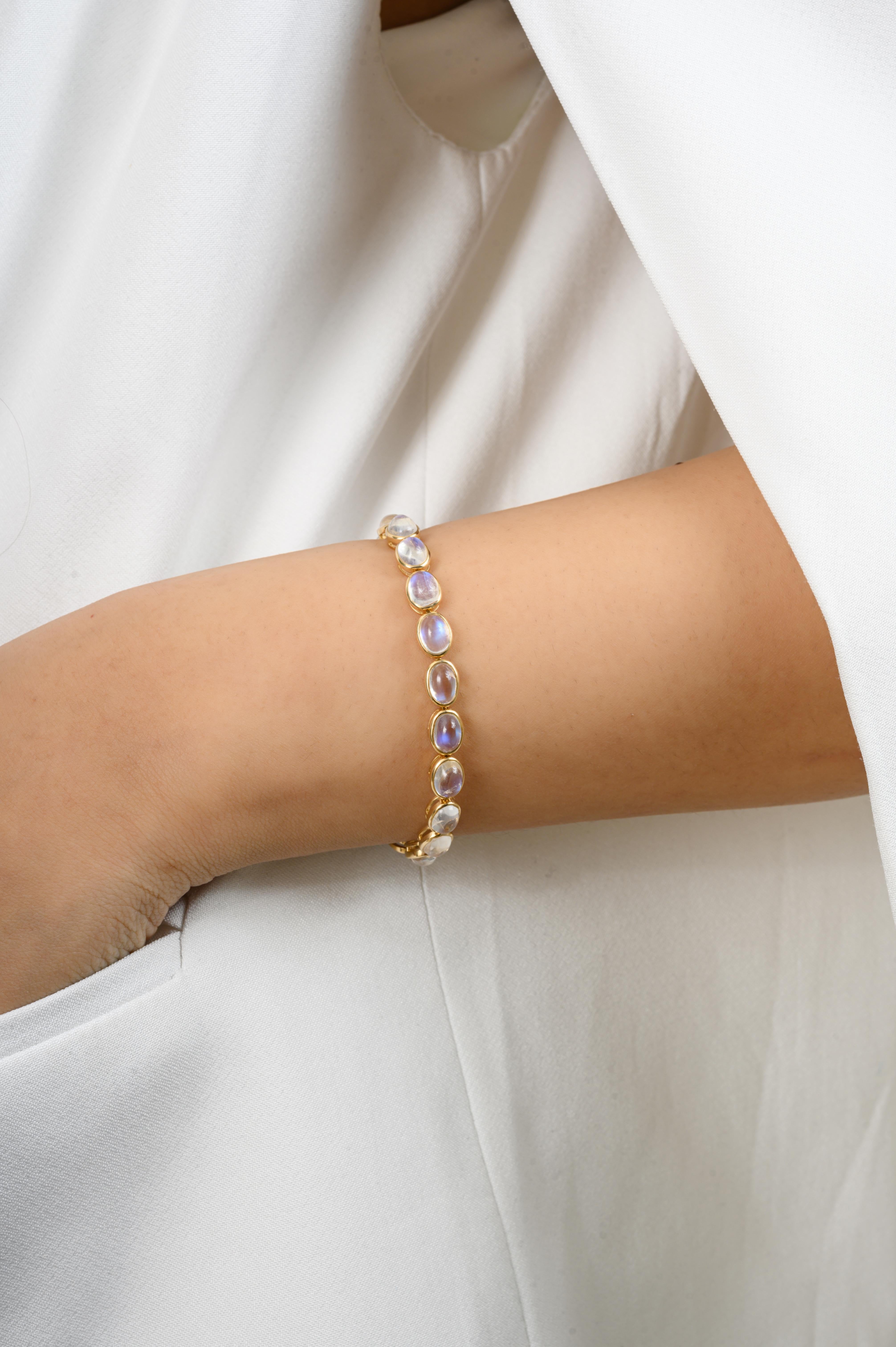 Oval Cut 18.63 Carats Oval Rainbow Moonstone Tennis Bracelet Crafted in 18k Yellow Gold For Sale