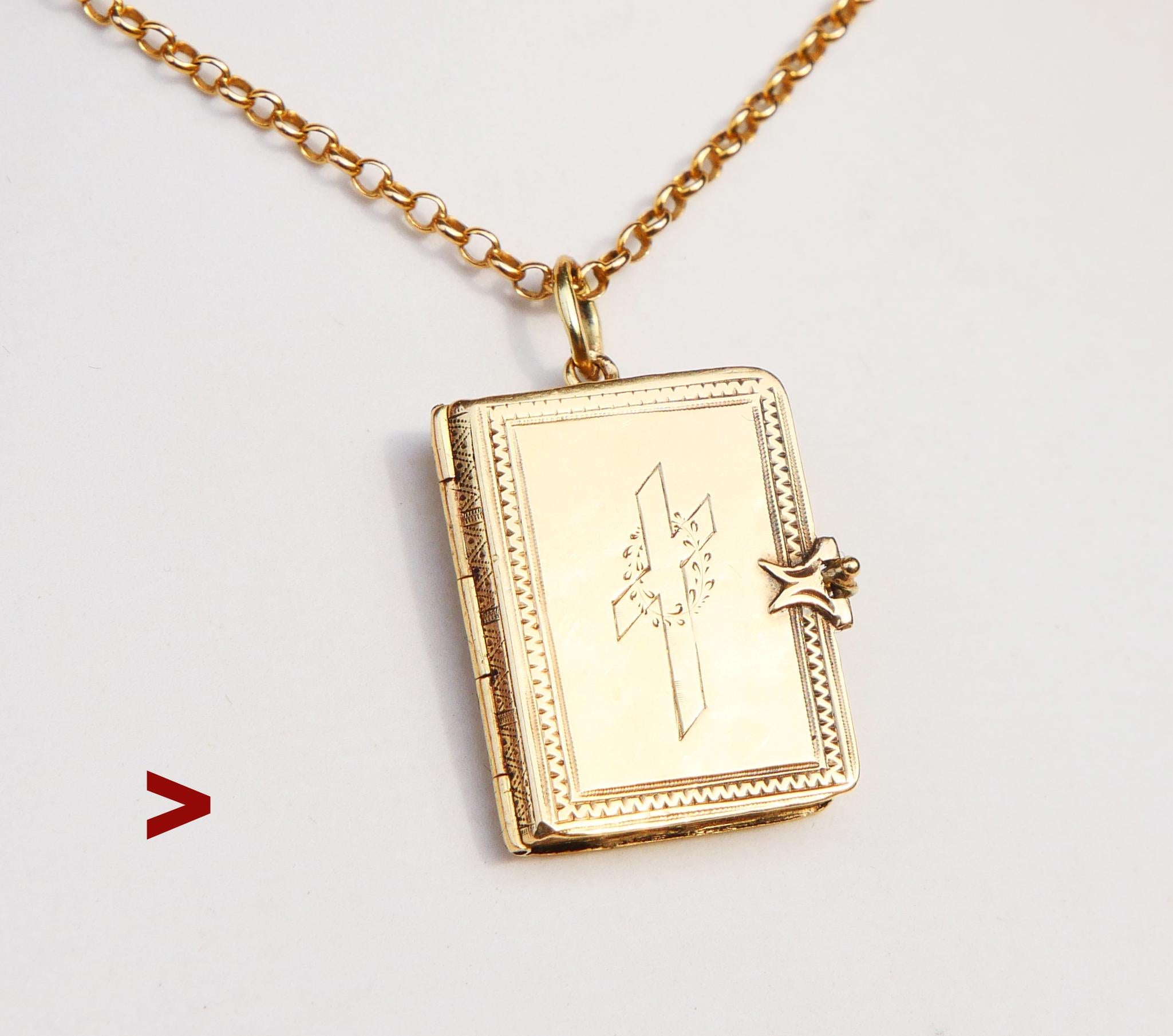 Antique Bible Book Pendant / Locket in solid 18K Greenish / Yellow Gold with skillfully engraved decor of on both sides. Intricate lock keeps the sides securely closed. The bezels are removable.

The loop has worn Swedish 18K hallmarks. Maker and
