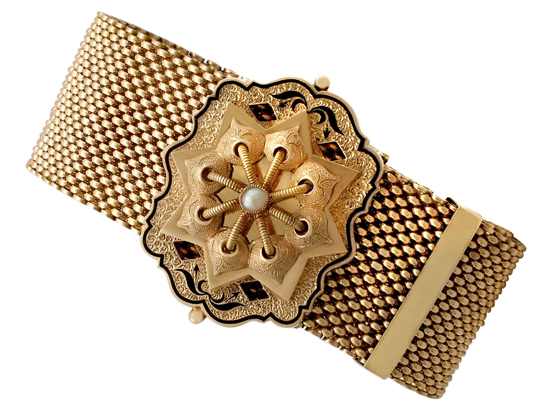 A stunning pair of seed pearl and black enamel, 14 karat yellow gold mesh bracelets; part of our diverse antique jewelry and estate jewelry collections.

These stunning, fine and impressive Victorian bracelets have been crafted in 14K yellow