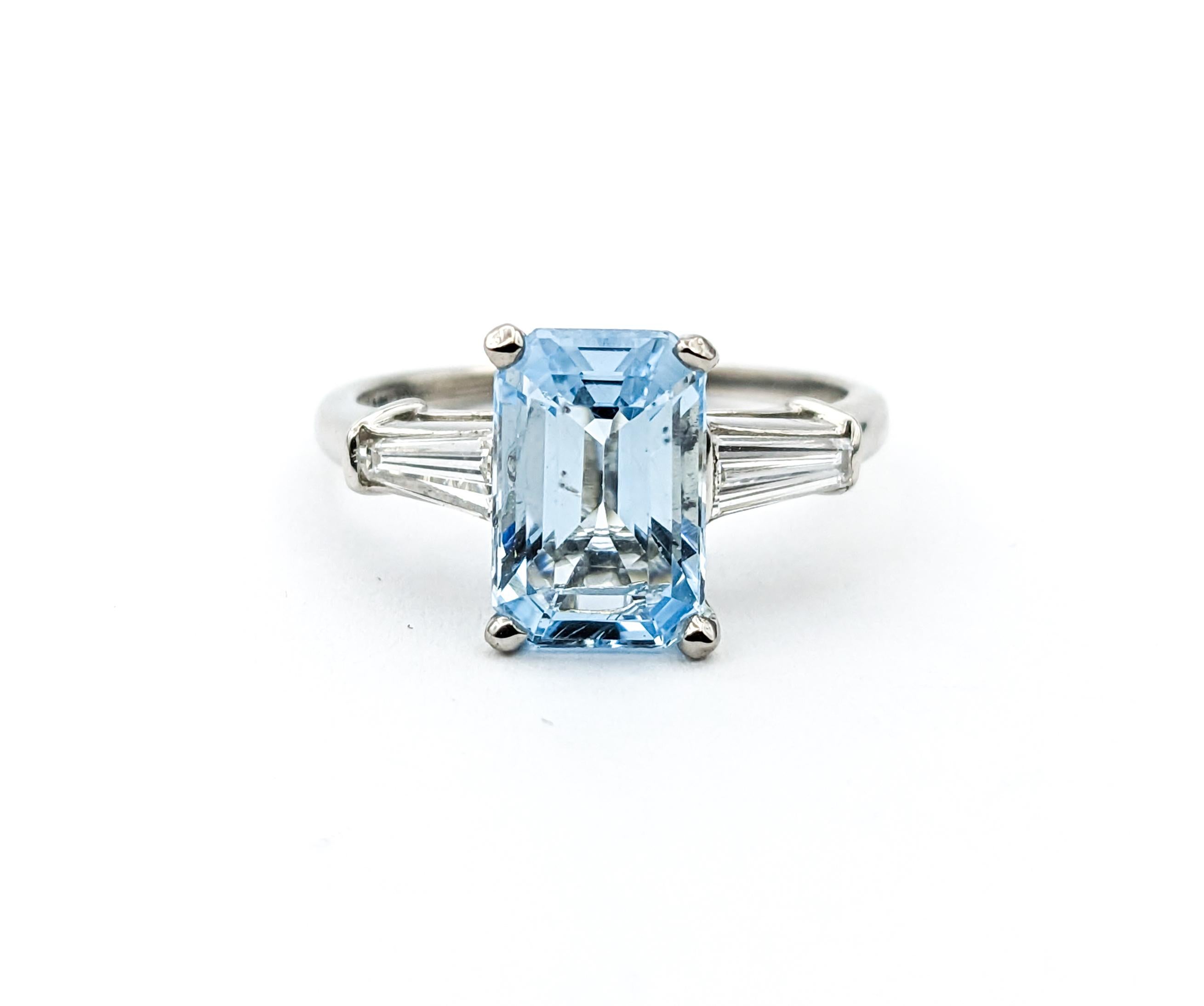 1.86ct Emerald Cut Aquamarine & Diamond Ring In Platinum

Explore the elegance of our stunning ring, finely crafted in 900 Platinum. The centerpiece features a captivating 1.86ct aquamarine in an Emerald Cut, adding a serene touch of color. The