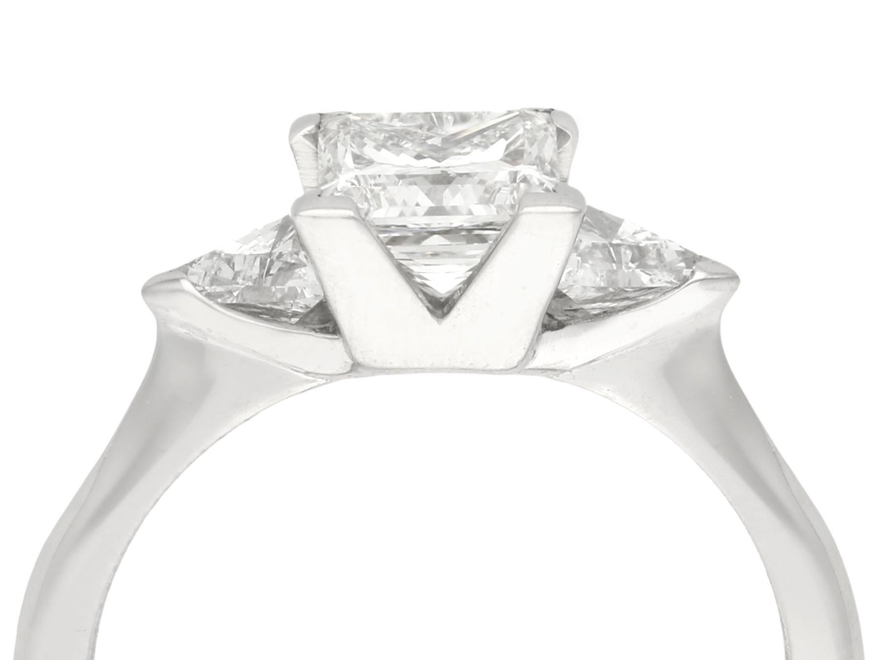 A stunning, fine and impressive 1.87 carat diamond and platinum contemporary three stone ring; part of our diverse diamond jewelry collections.

This stunning contemporary princess cut diamond engagement ring has been crafted in platinum.

The