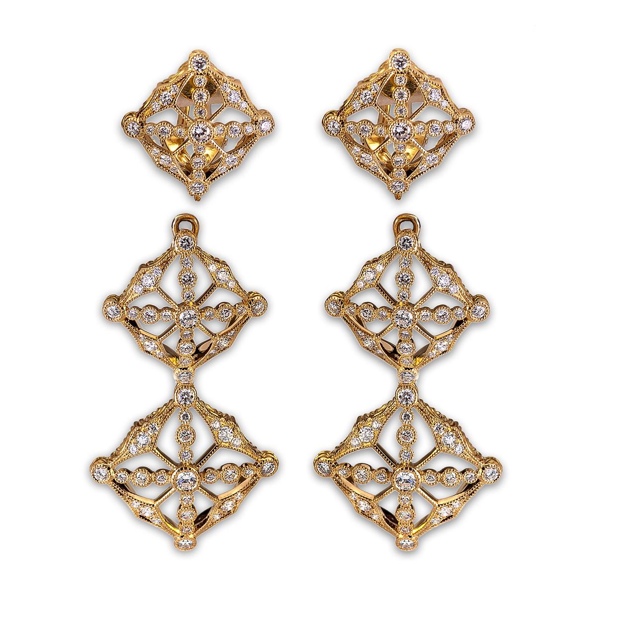 18 karat yellow gold earrings created by world-renowned jewelry designer, Danuta, masterfully set with 1.87 carats F-VVS white diamonds which strategically line the three-tiered contemporary open and versatile design. The elegantly dangling design