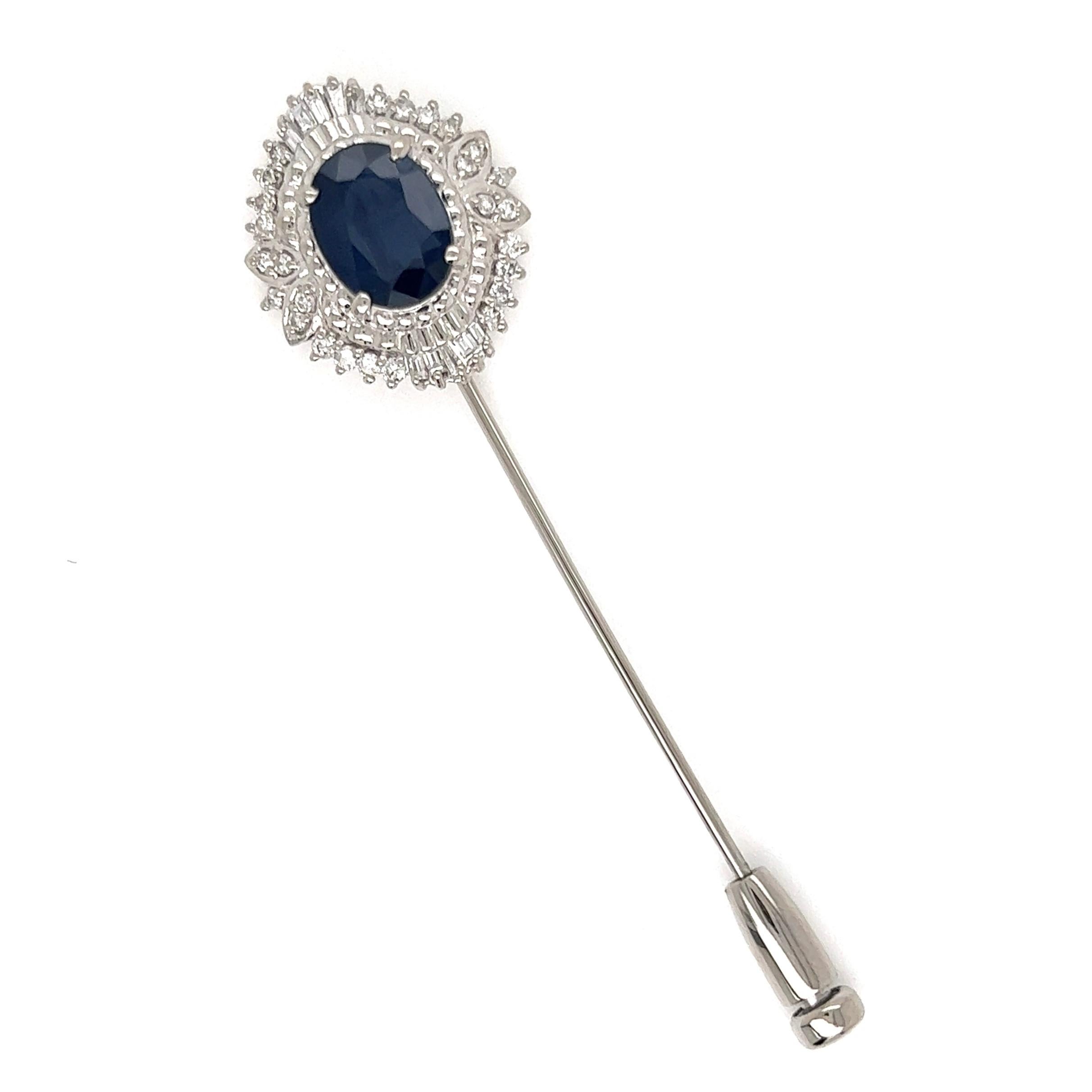 Simply Beautiful! Finely detailed Platinum Stick Pin. Center securely nestled with a Hand set Oval Blue Sapphire weighing approx. 1.87 Carat. Surrounded by Hand set Diamonds, approx. 0.39tcw. Artistically Hand crafted in Platinum. Dimensions: 2.25”