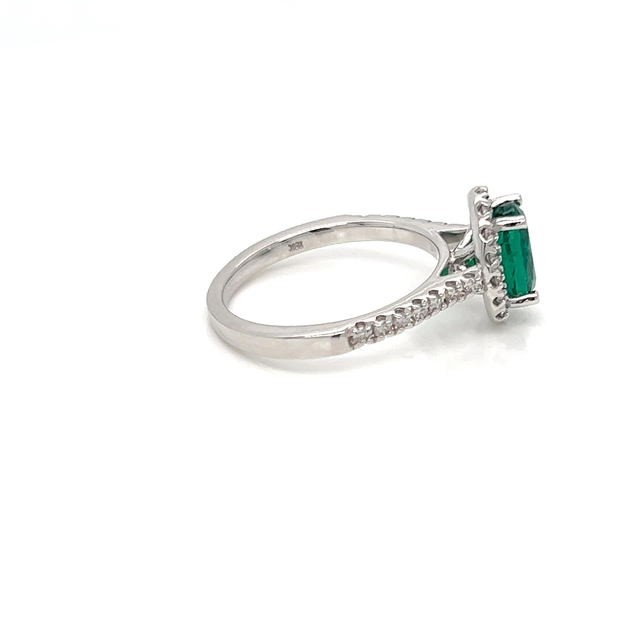 Oval Cut 1.87 Carat Oval cut Emerald and Diamond Halo Engagement Ring  For Sale