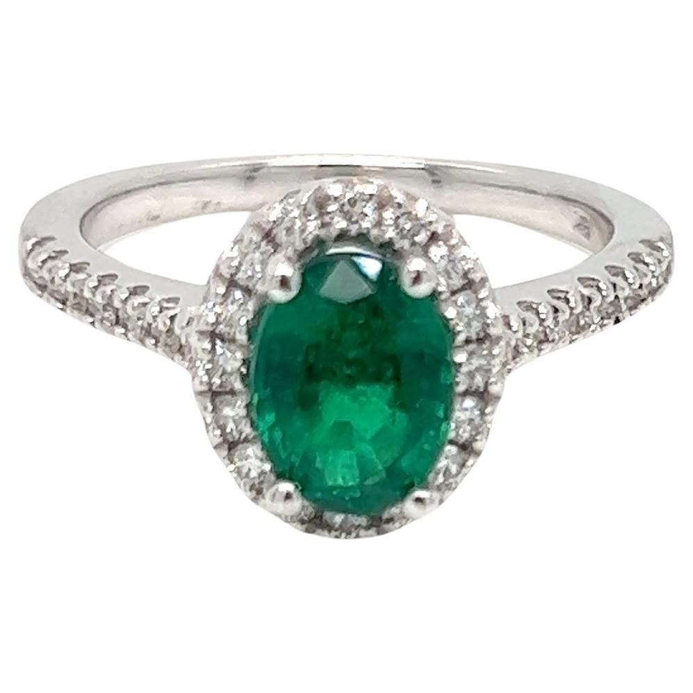 1.87 Carat Oval cut Emerald and Diamond Halo Engagement Ring  For Sale