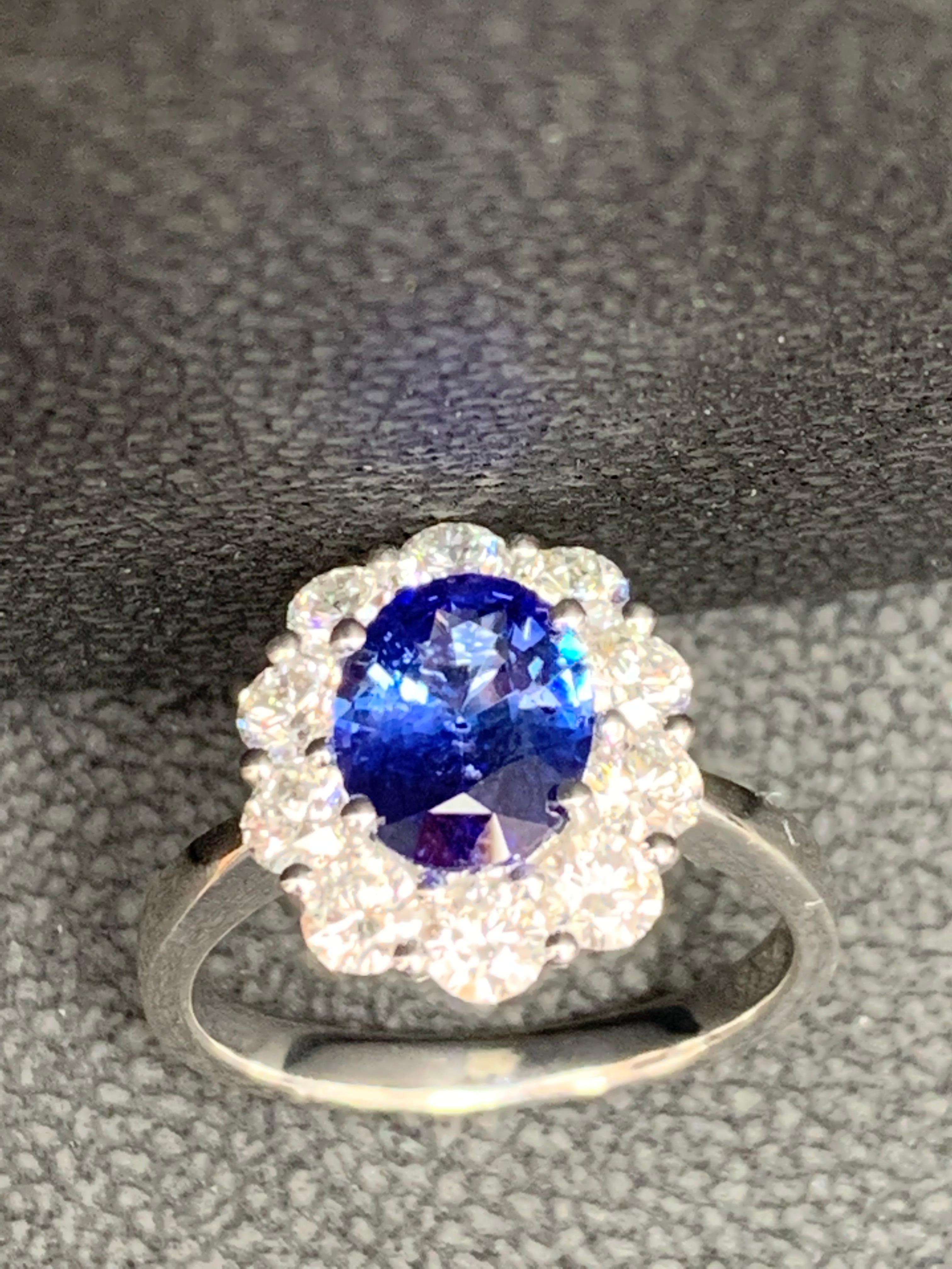 1.87 Carat Oval Cut Sapphire and Diamond Engagement Ring in 18K White Gold For Sale 12