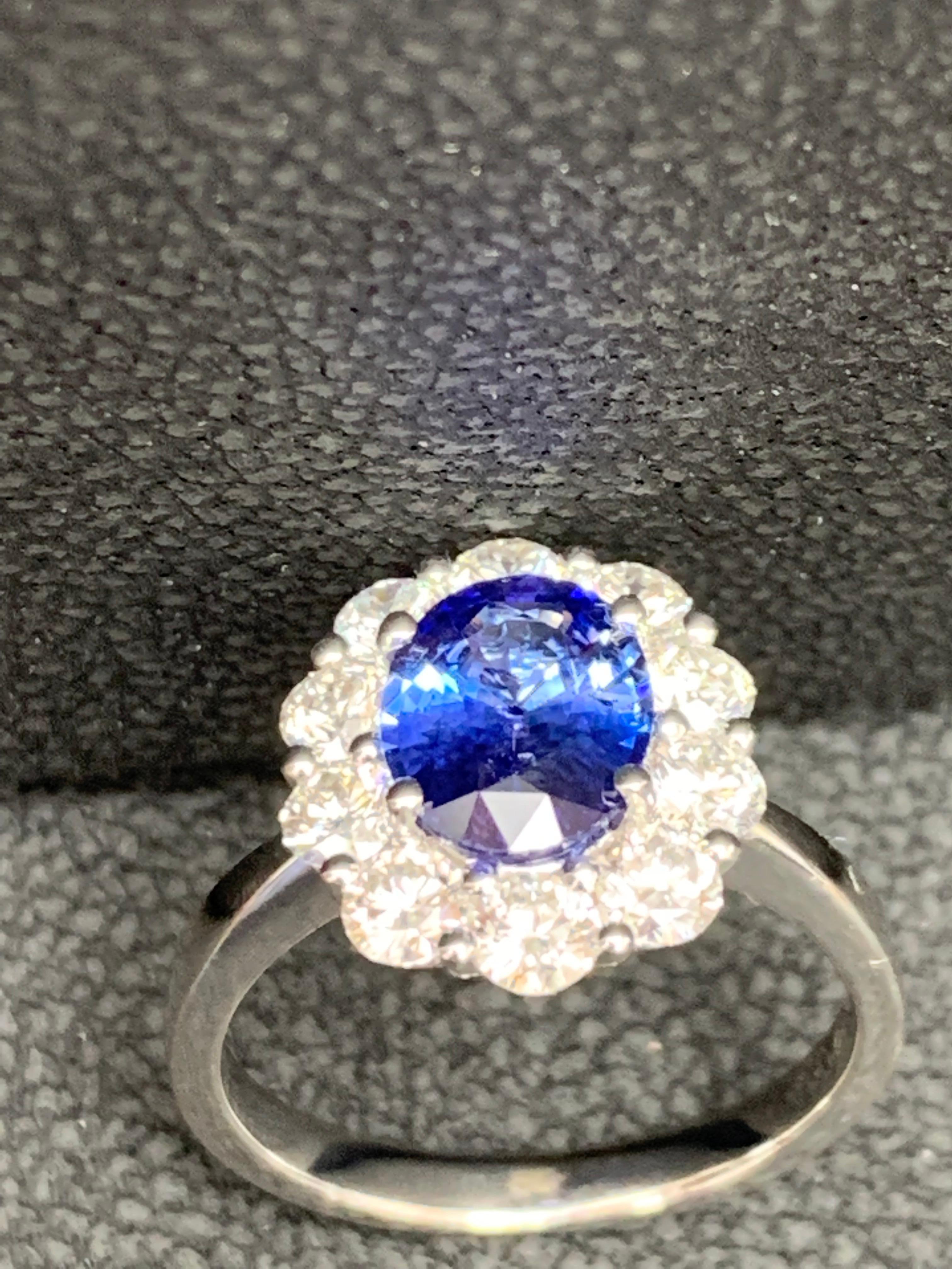 1.87 Carat Oval Cut Sapphire and Diamond Engagement Ring in 18K White Gold For Sale 13
