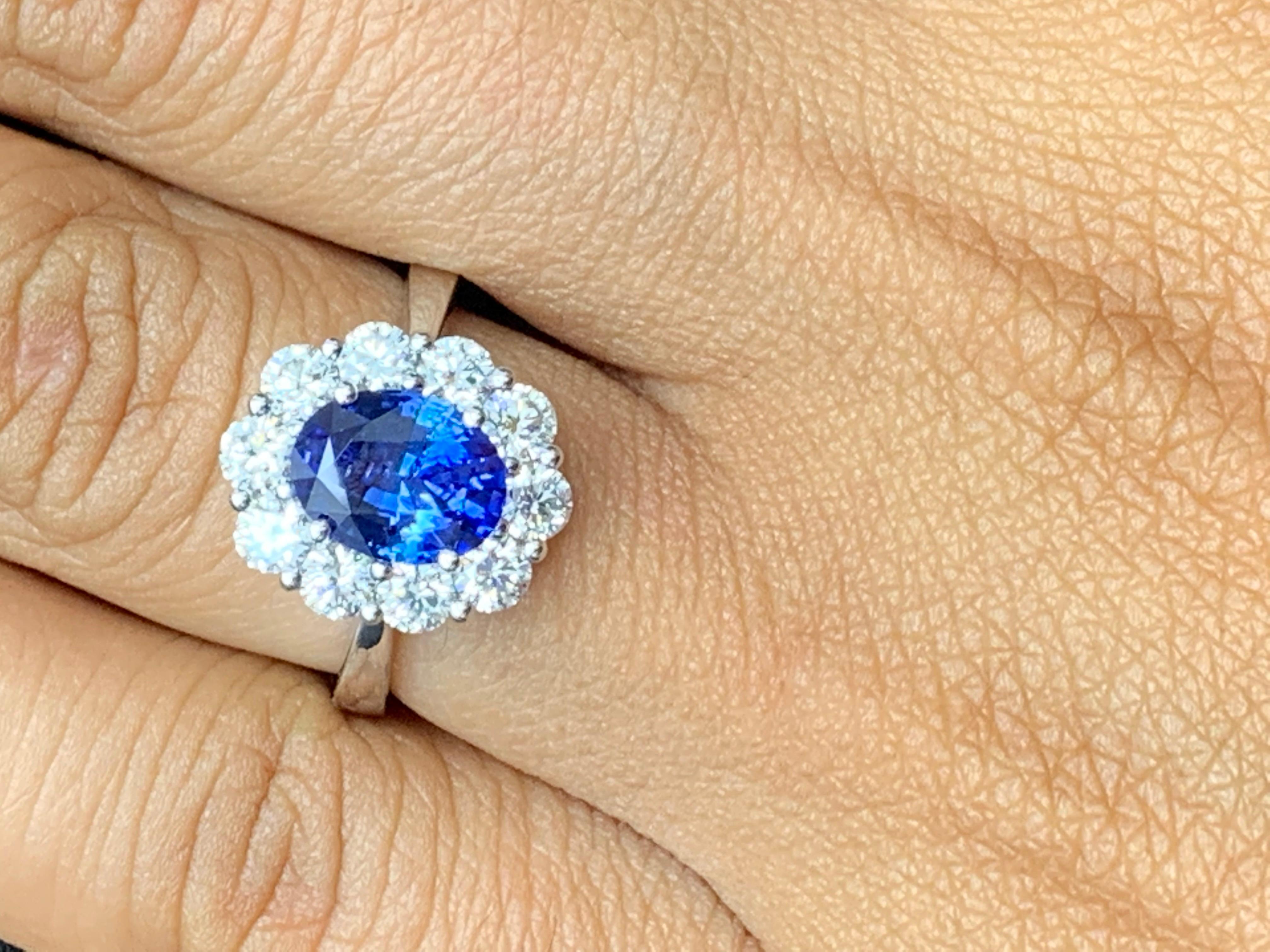 1.87 Carat Oval Cut Sapphire and Diamond Engagement Ring in 18K White Gold In New Condition For Sale In NEW YORK, NY