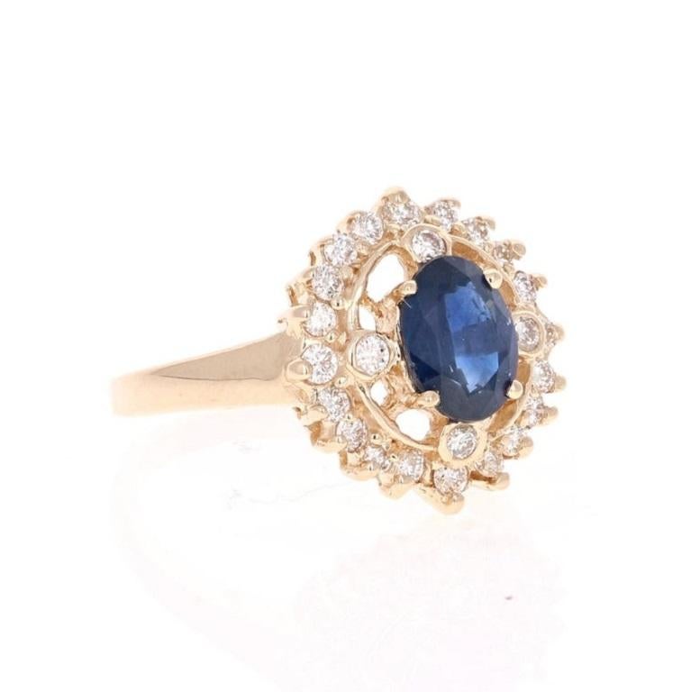 This ring has a Natural Oval Cut Sapphire that weighs 1.37 carat and measures at 8 mm x 6 mm. 

It also has 24 Round Cut Diamonds that weigh 0.50 carats. The Clarity and Color is VS-H. 

The ring is a size 7 and can be re-sized at no additonal cost. 