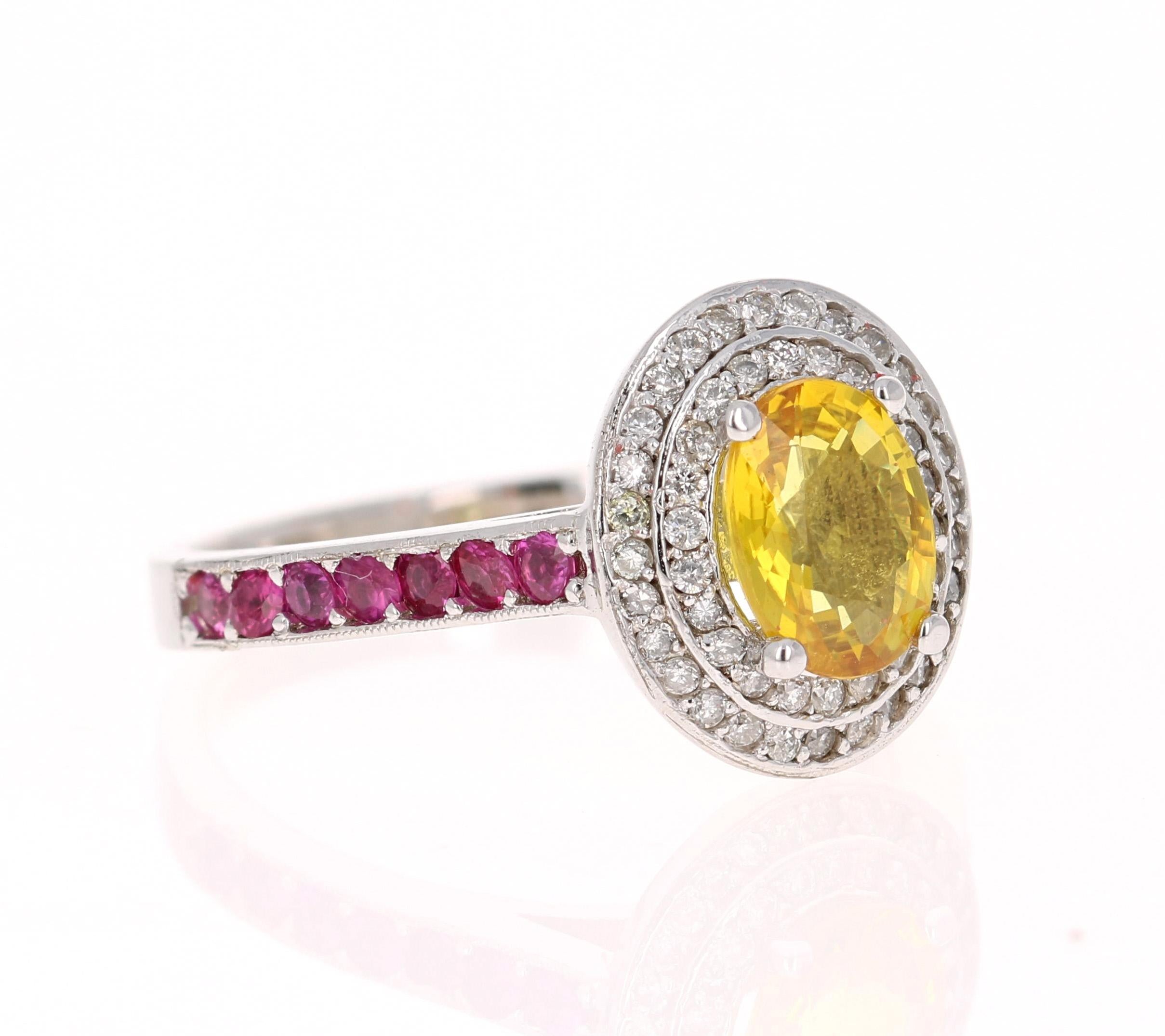 This ring has a 1.16 Carat Oval Cut Natural Yellow Sapphire. 
It has a halo of 54 Round Cut Diamonds that weigh 0.29 carats (Clarity: SI, Color: F) and 14 Pink Sapphires that weigh 0.42 Carats. The total carat weight of the ring is 1.87 Carats. 

It