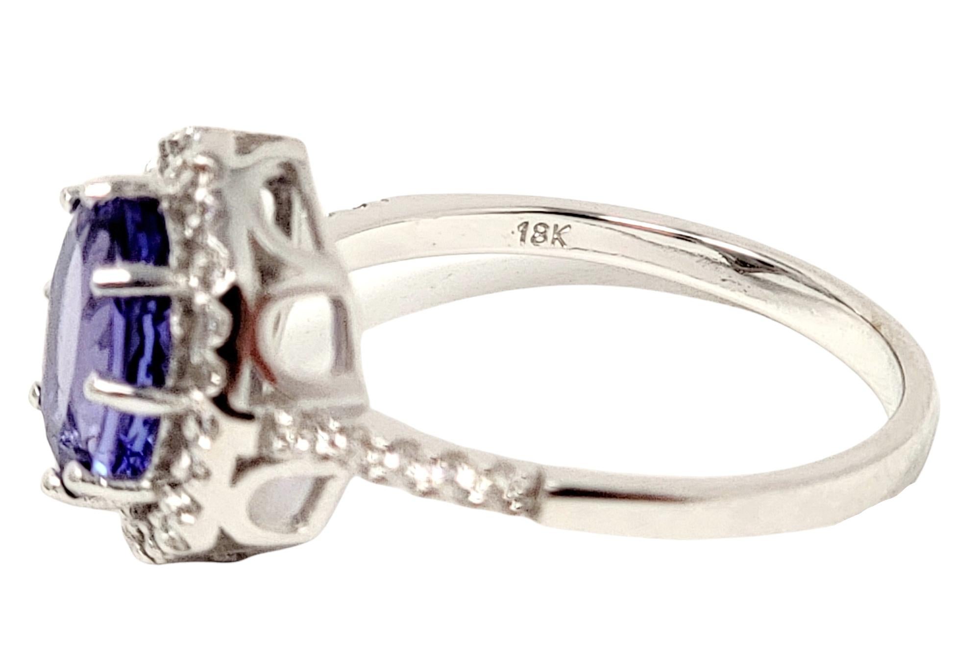 1.87 Carats Total Oval Tanzanite and Diamond Halo Ring in 18 Karat White Gold For Sale 4
