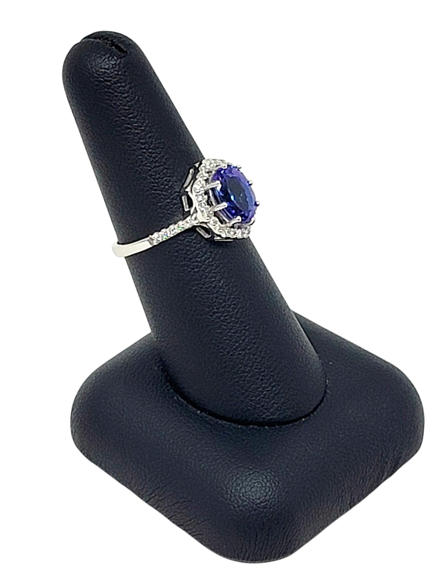 1.87 Carats Total Oval Tanzanite and Diamond Halo Ring in 18 Karat White Gold For Sale 6