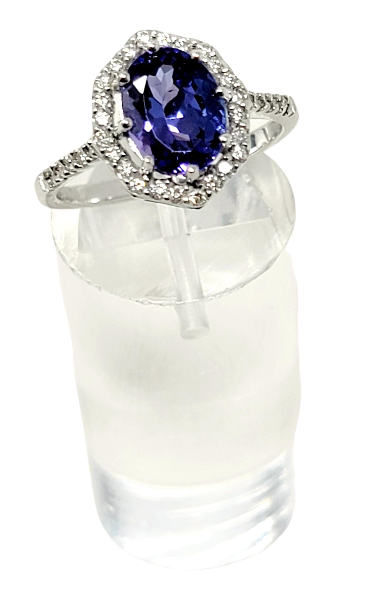 Women's 1.87 Carats Total Oval Tanzanite and Diamond Halo Ring in 18 Karat White Gold For Sale