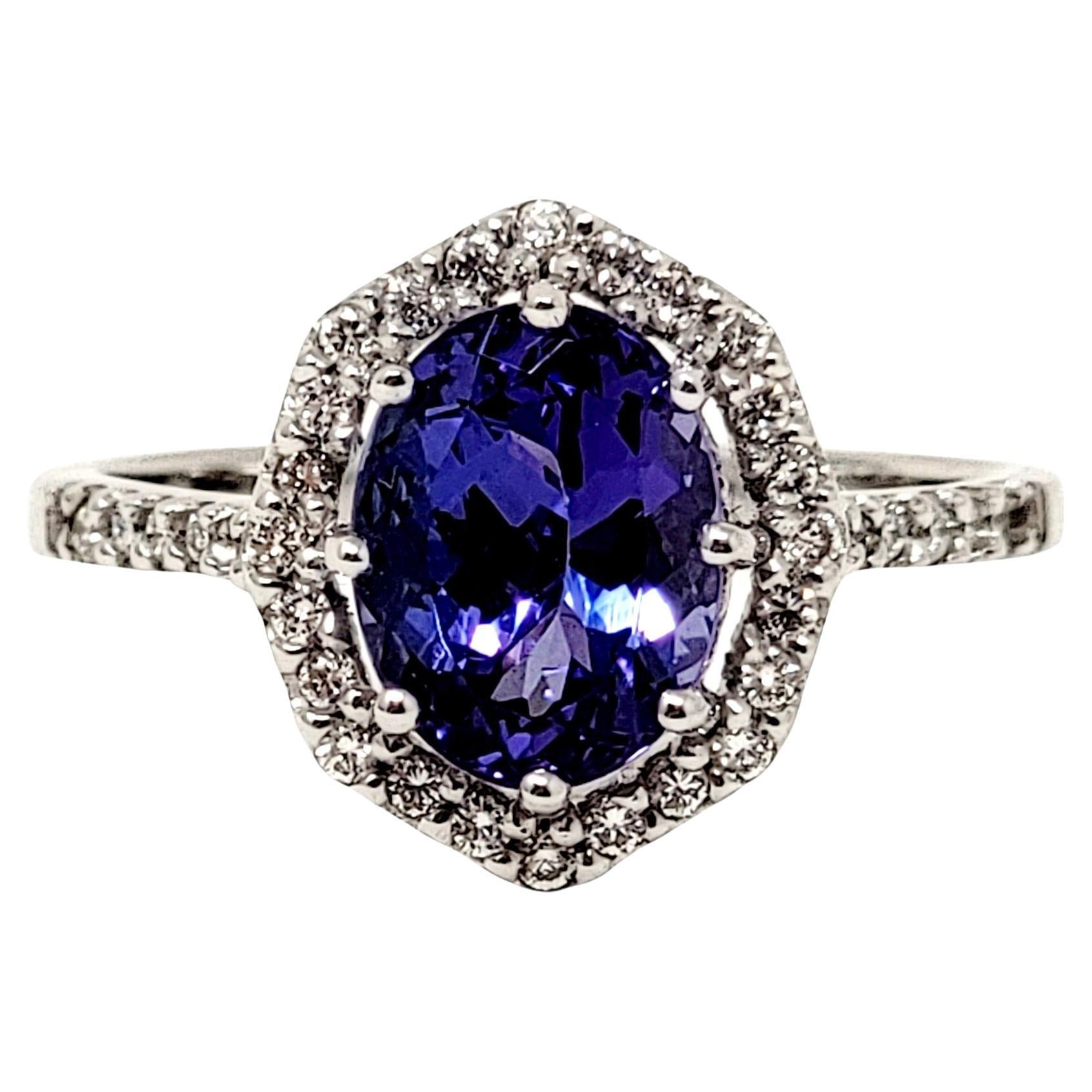 1.87 Carats Total Oval Tanzanite and Diamond Halo Ring in 18 Karat White Gold For Sale