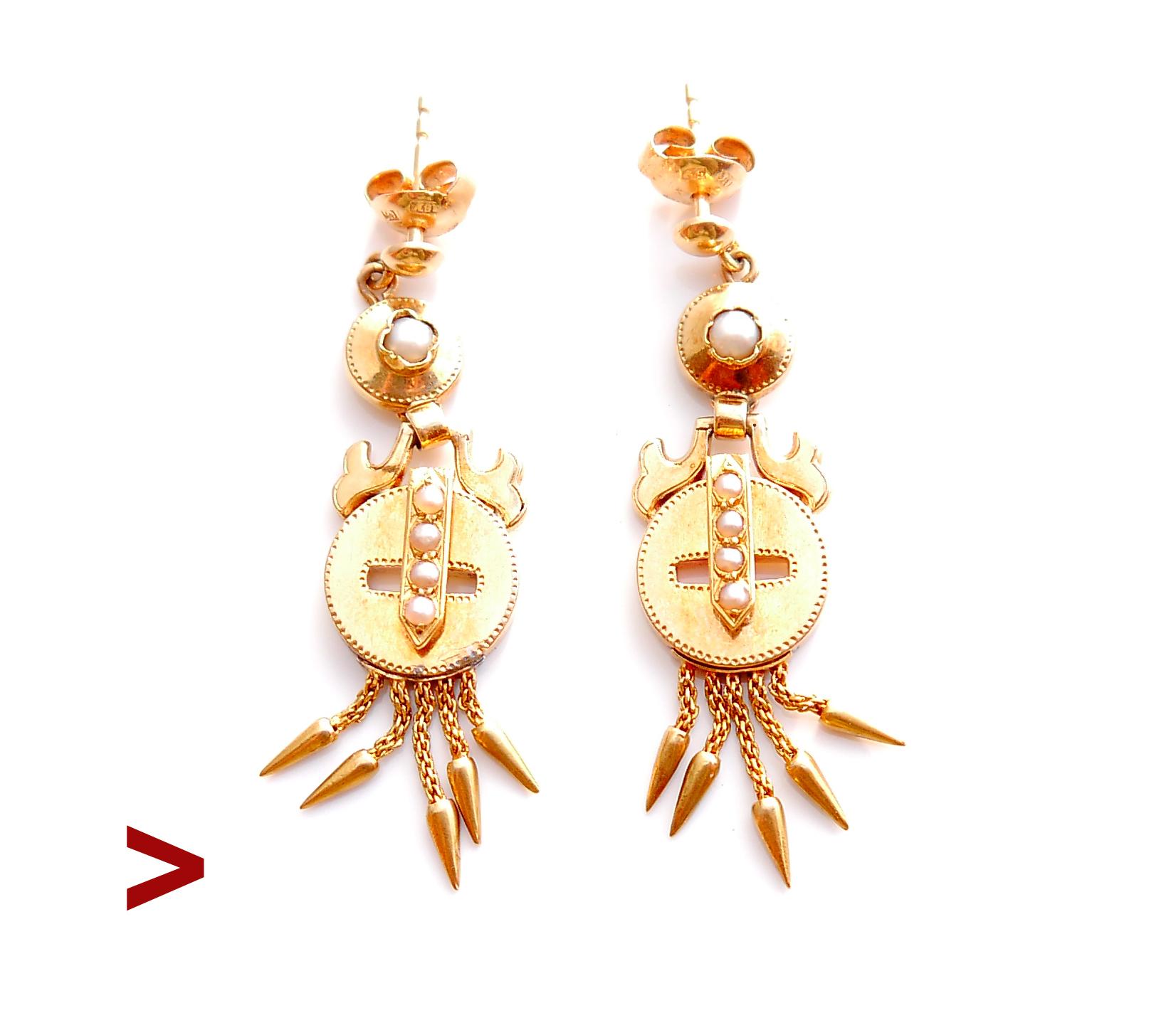 A pair of old 18K Gold earrings decorated with natural river /seed Pearls.

Freely suspended and moving drop-shaped dangles on woven chains, dot - planished decor on the borders.

Each earring is 47 mm long suspended. Each round part with 4 pearls Ø