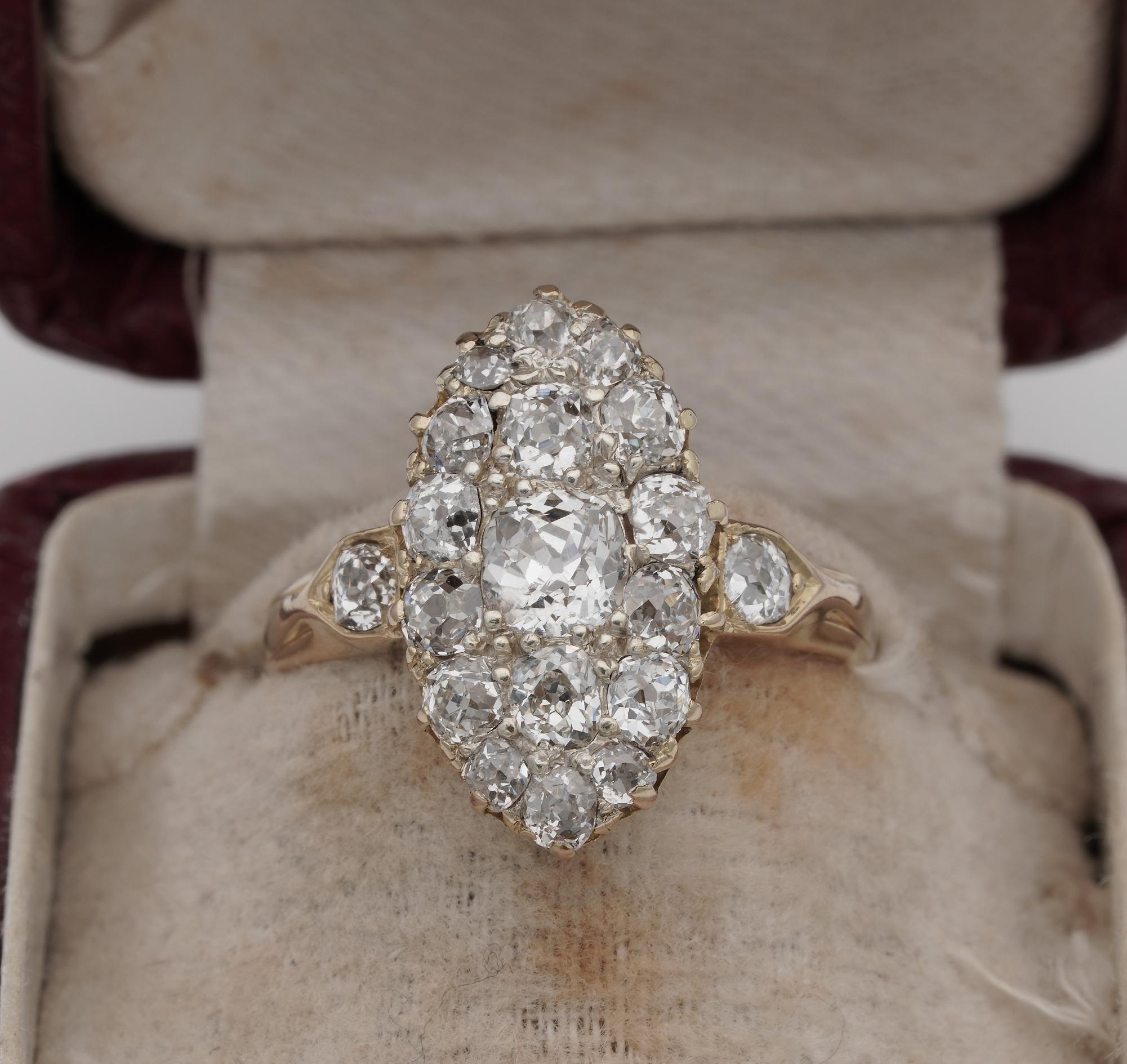 From the treasury Box!

This very pretty antique Victorian ring dates 1870 ca, early example, boasts marvellous workmanship from the era, pristine condition – tests 18 KT gold
The feminine navette shaped crown is set with a rich selection of deep