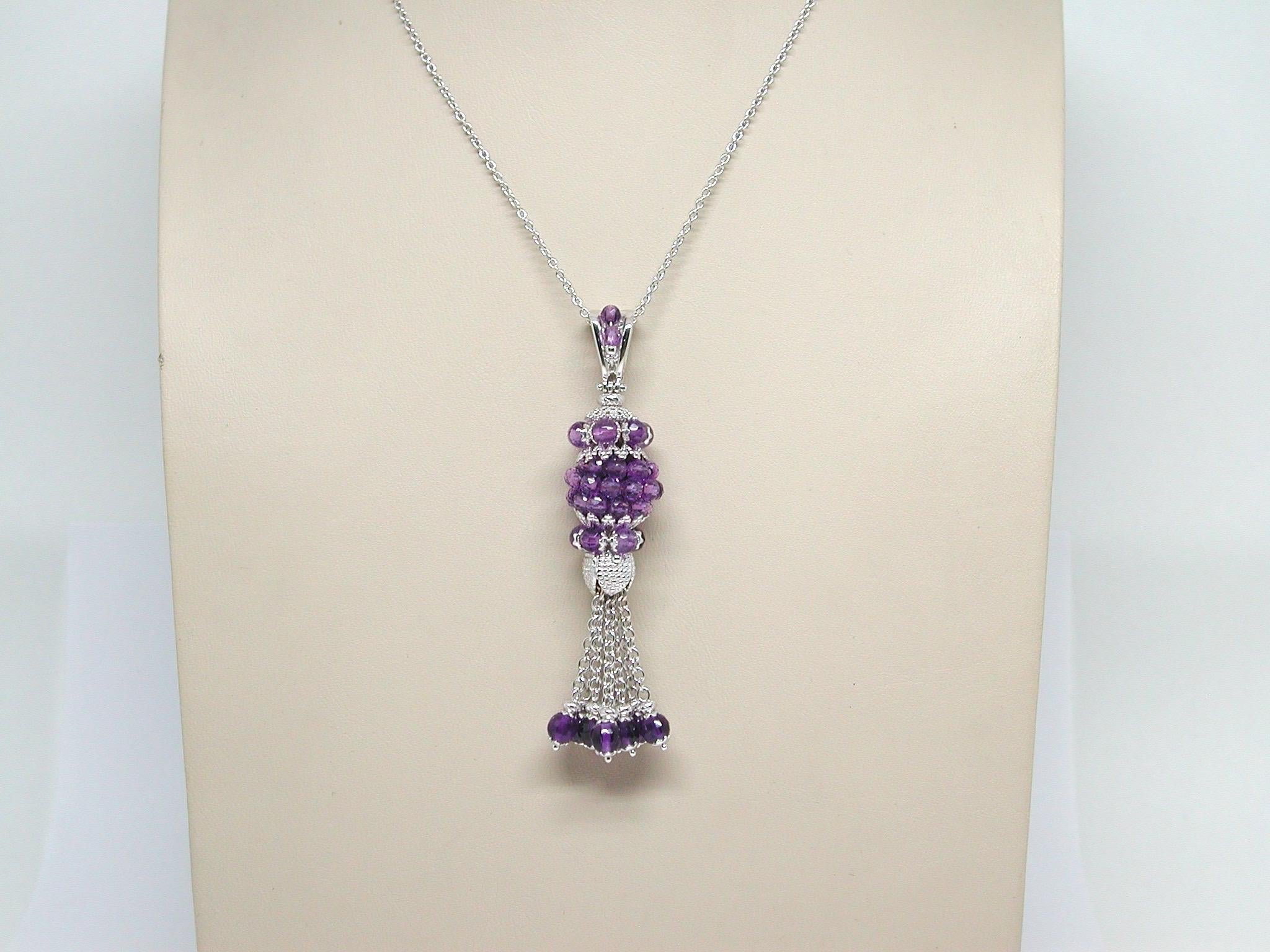 Gold: 18 K white gold 
Weight: 16,70 grams. 
Amethyst: 18,70ct. 
Length: 7,0cm. 
Length chain: choose between 40, 42, 45 or 50cm. 
Width: 1,4 cm. 
All our jewellery comes with a certificate and a 5 year guarantee 
Shipping: Free worldwide insured