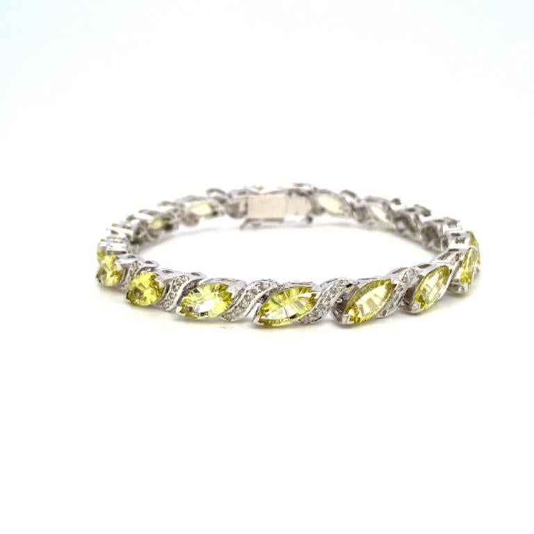 18.70 Carats Lemon Quartz and Diamond Engagement Bracelet in Sterling Silver showcases endlessly sparkling natural lemon quartz, weighing 18.90 carat and diamonds weighing 0.70 carats. It measures 7 inches long in length. 
lemon quartz improves