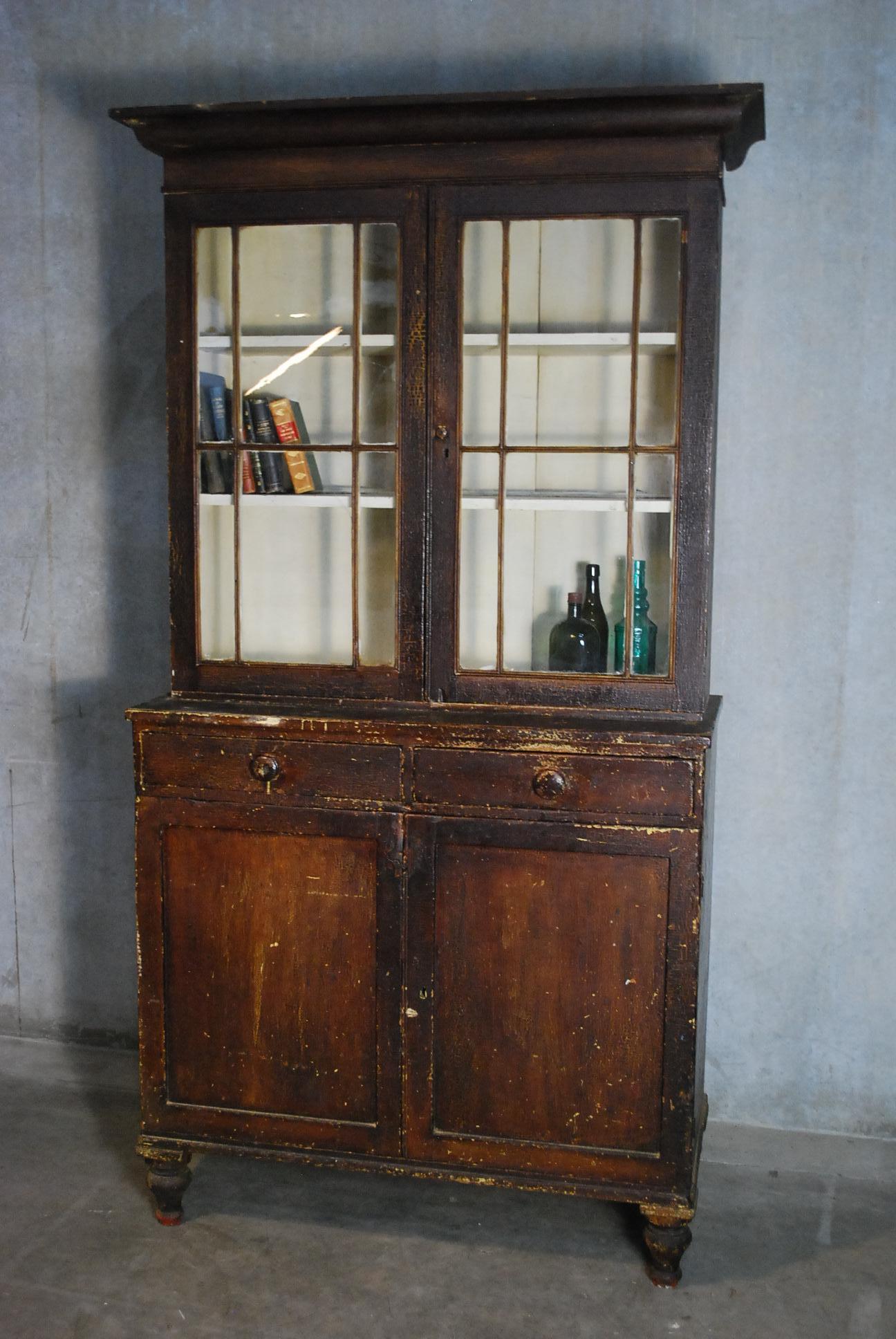Very nice two-piece country cupboard in original untouched age cracked painted surface. This piece is a perfect preserved antique piece,
Farm fresh.