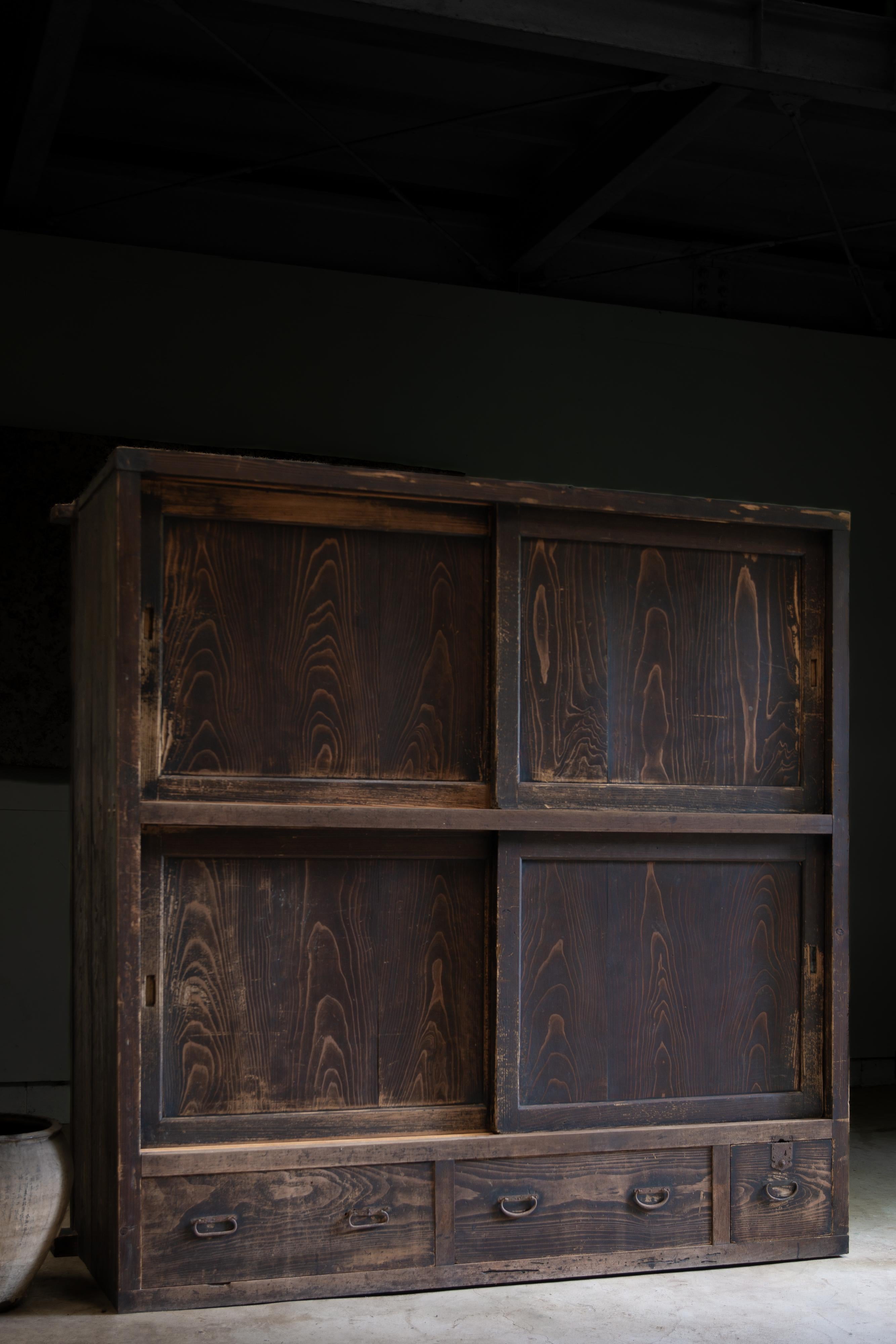 New finds from Kanto or Tohoku area, Japan.

This large Mizuya tansu is made from premium quality, reddish Sugi Cedar, the product of circa 1870s to 1900s (Meiji to early Taisho period).
Relatively larger than a typical Mizuya tansu, Having storage