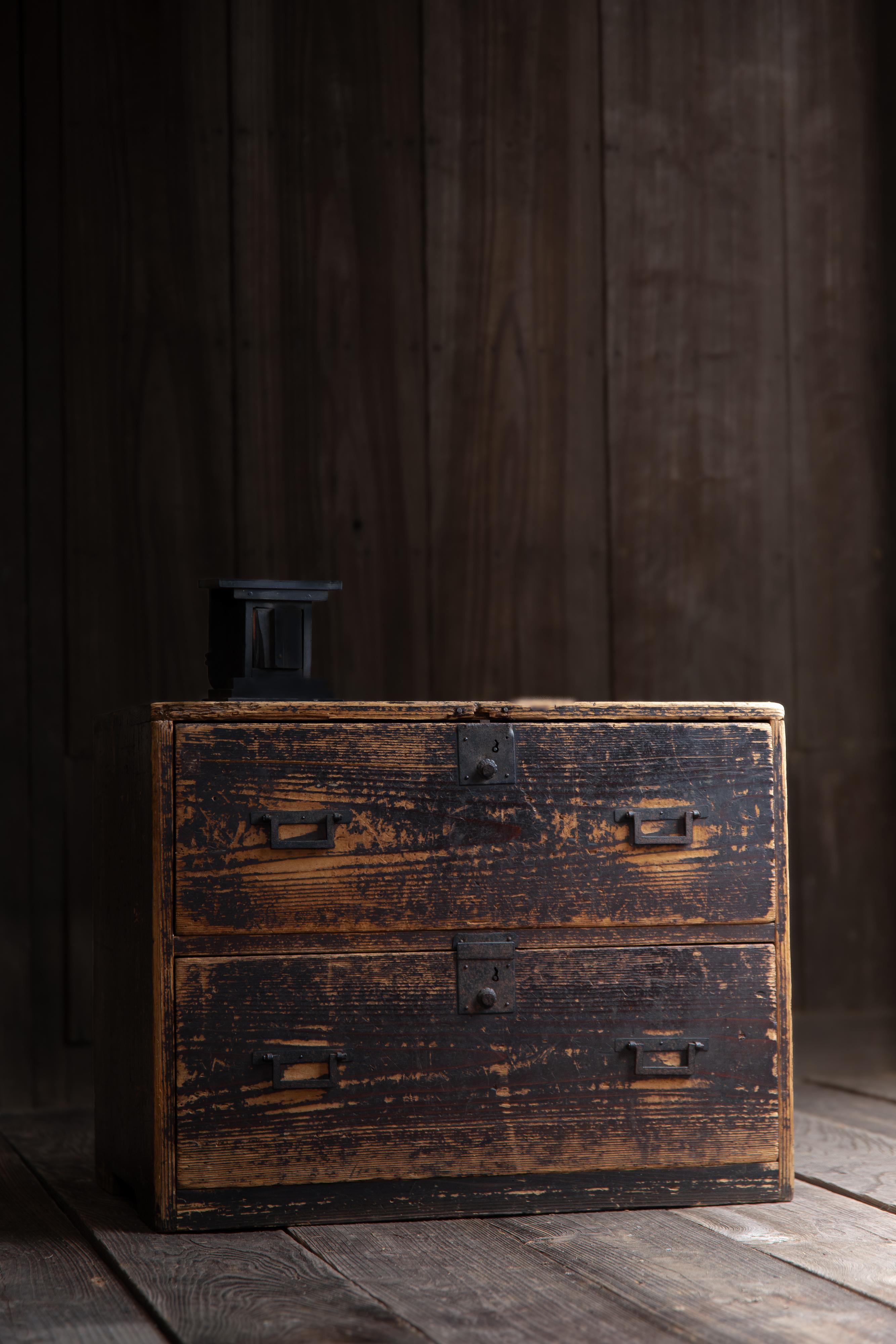 Japanese antique mid size Tansu (chest of drawers), product of circa 1870s - 1900s, late Edo to Meiji era, estimate from the style & conditions.
Remaining original paint gives a nice wabi sabi touch. 
Square shape Iron drawer handles (Kakute) are