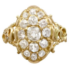 1870s Antique Victorian 1.51 Carat Diamond and Yellow Gold Cocktail Ring