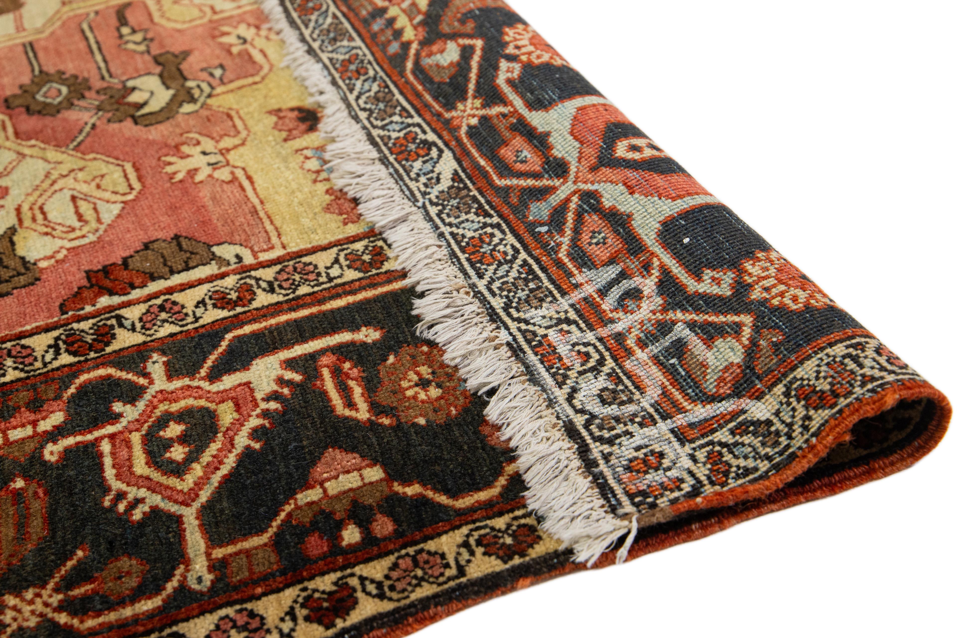 Heriz Serapi 1870s Antique Wool Rug Persian Serapi Featuring a Medallion Motif In Rust Color For Sale