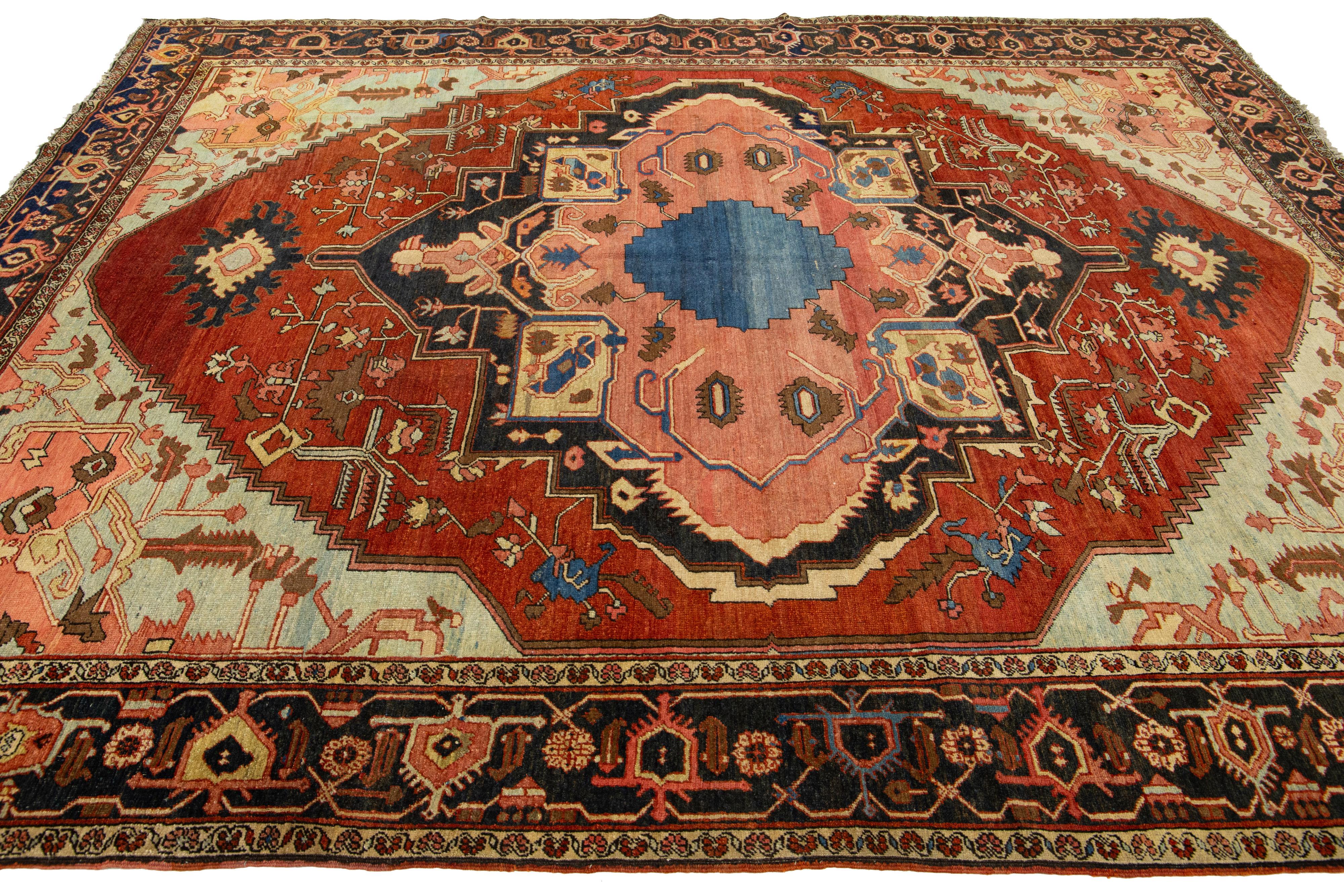1870s Antique Wool Rug Persian Serapi Featuring a Medallion Motif In Rust Color In Excellent Condition For Sale In Norwalk, CT