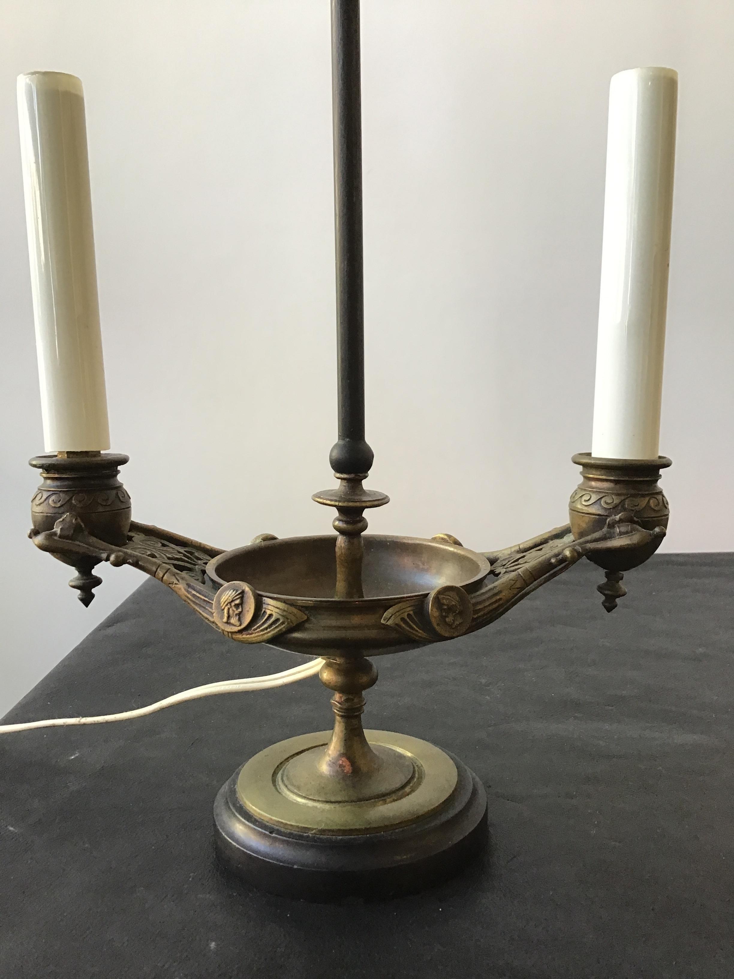1870s bronze oil lamp. Great finial with face.