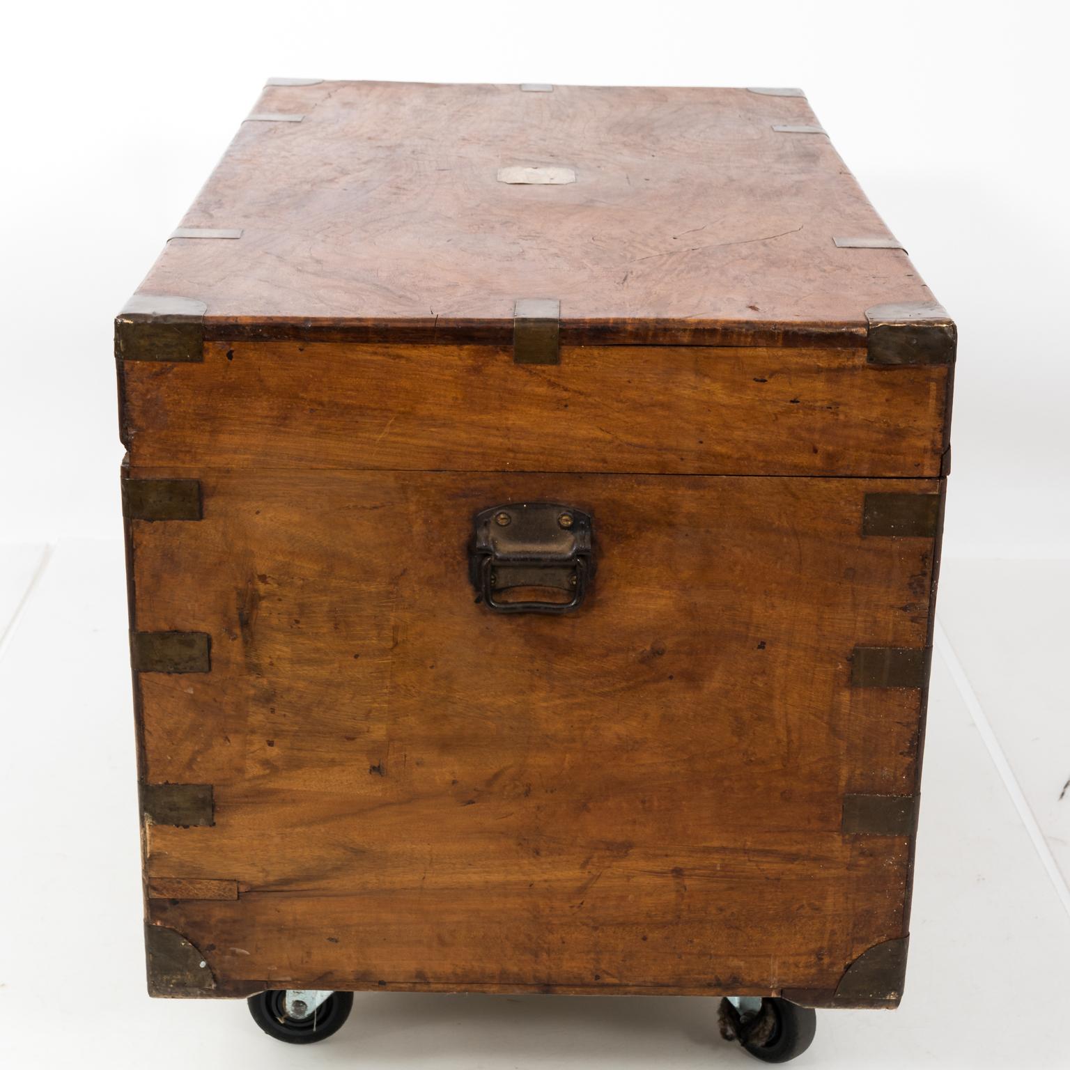 A military large size Campaign trunk, original brass handles and hardware. Double lock front. Manufactured for an office to carry his belongings on Campaign, circa 1870, England. Minor cracks due to age.
 