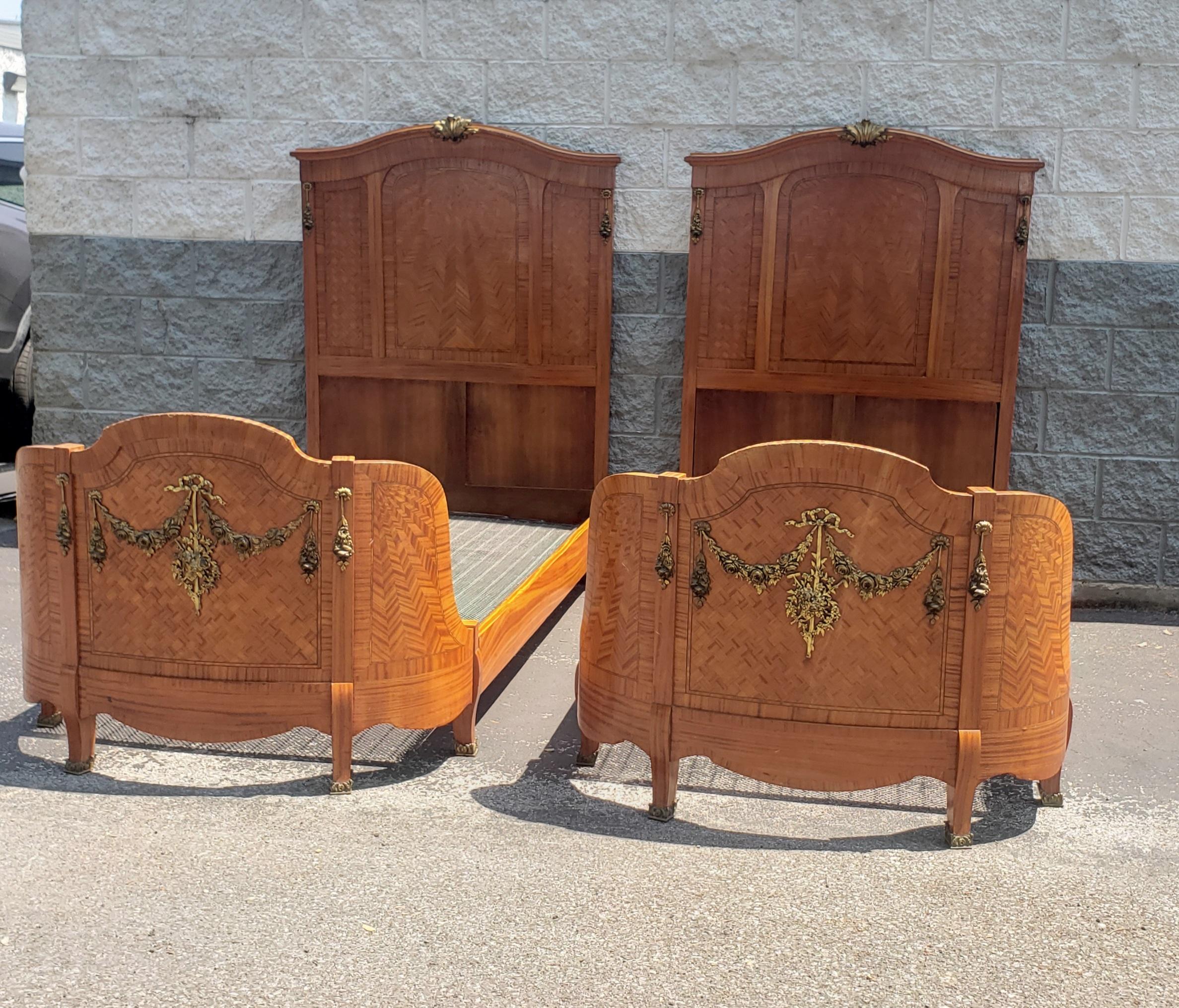 American 1870s Dutch Rococo Style Fruitwood and Satinwood Inlaid & Ormolu Bedsteads, Pair For Sale