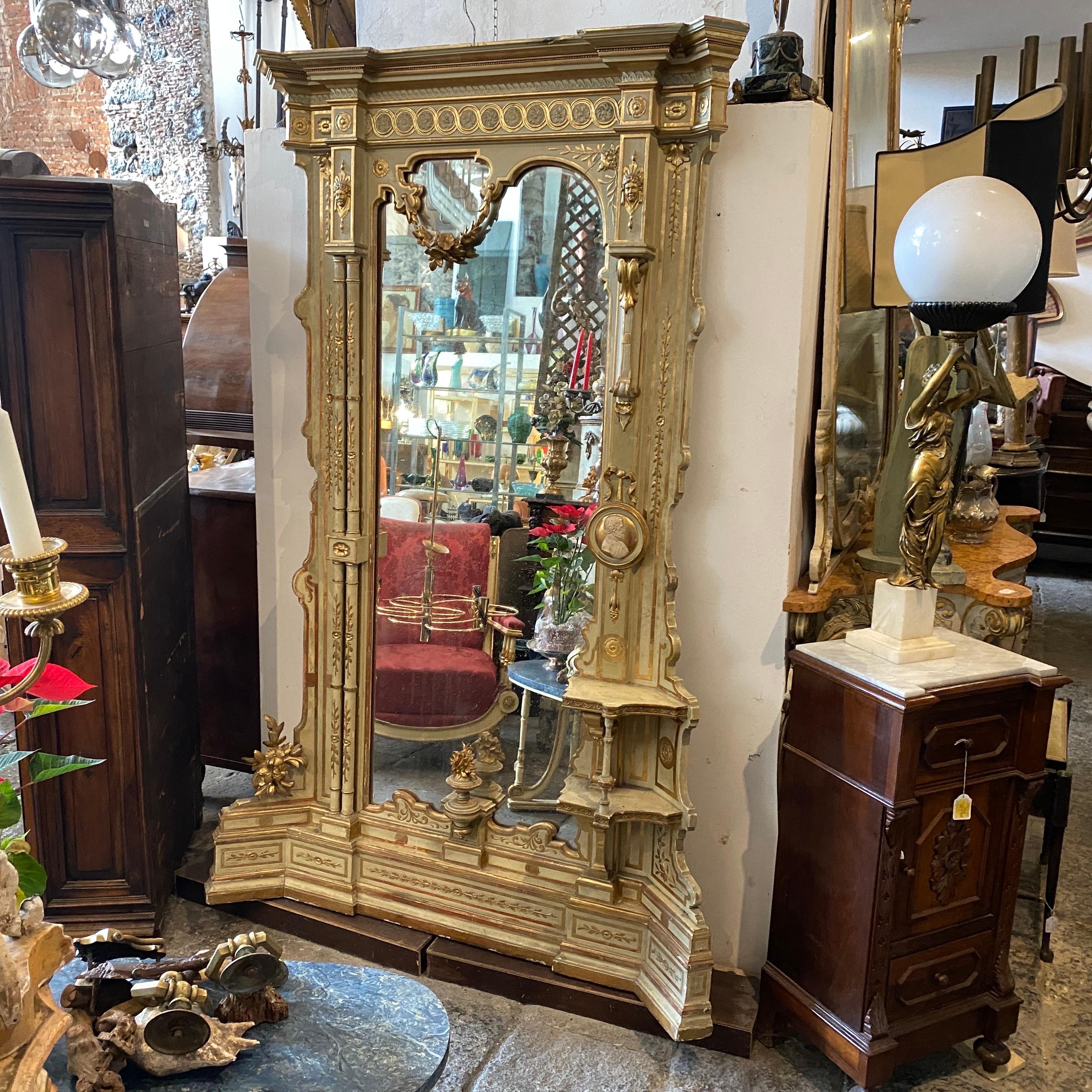 An amazing floor mirror hand-crafted in Sicily in the second half of 19th century, light green lacquer it's in original condition as the gilding, probably it was used in a big dining room. Obviously it has signs of use and age as you can see in the