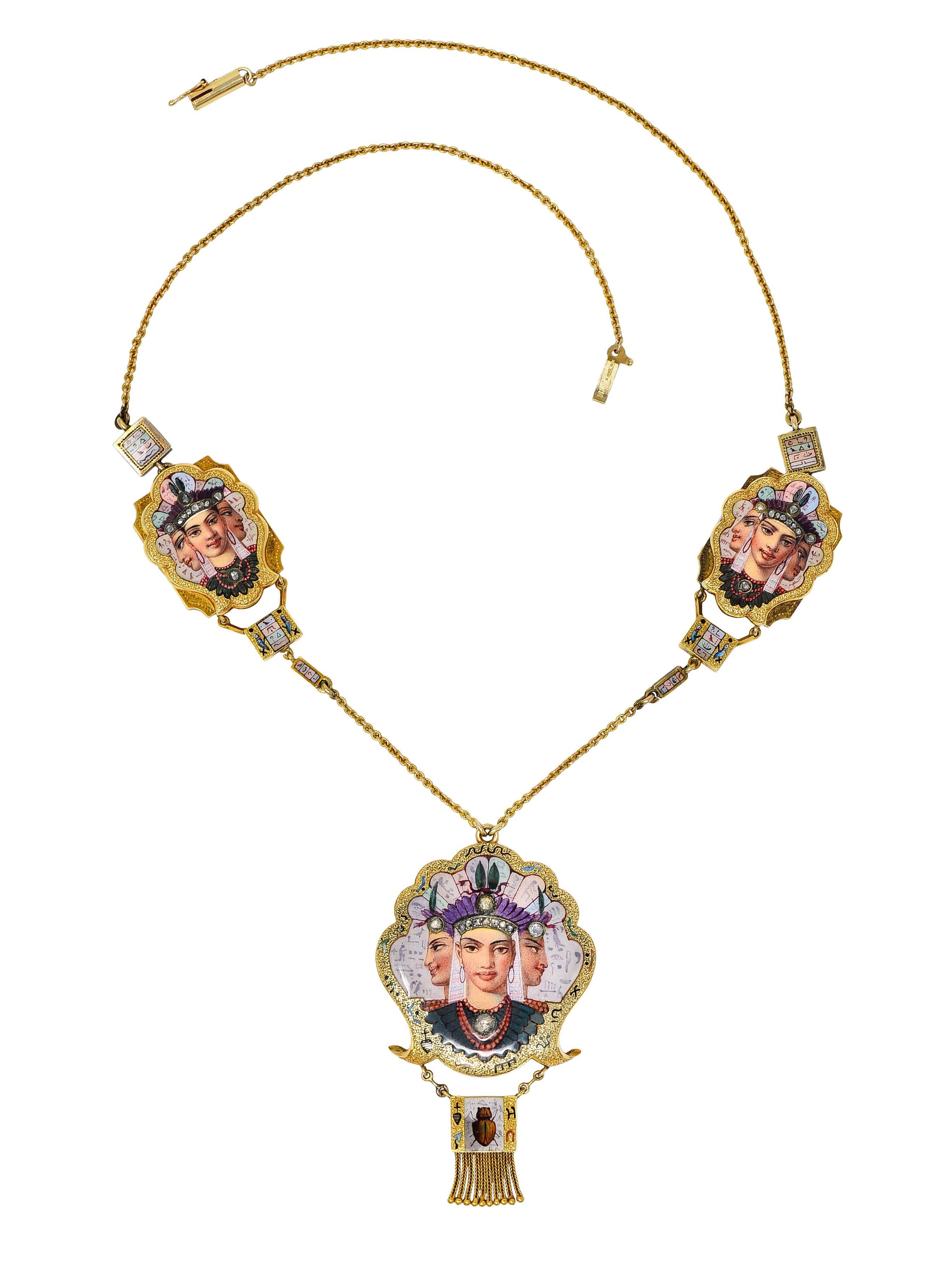 Swag style necklace features three ornate enamel stations

Depicting a triple faced goddess symbolizing birth, life, and death

With hieroglyphics throughout and rose cut diamond accents

Terminating as a fringe drop depicting a scarab motif -