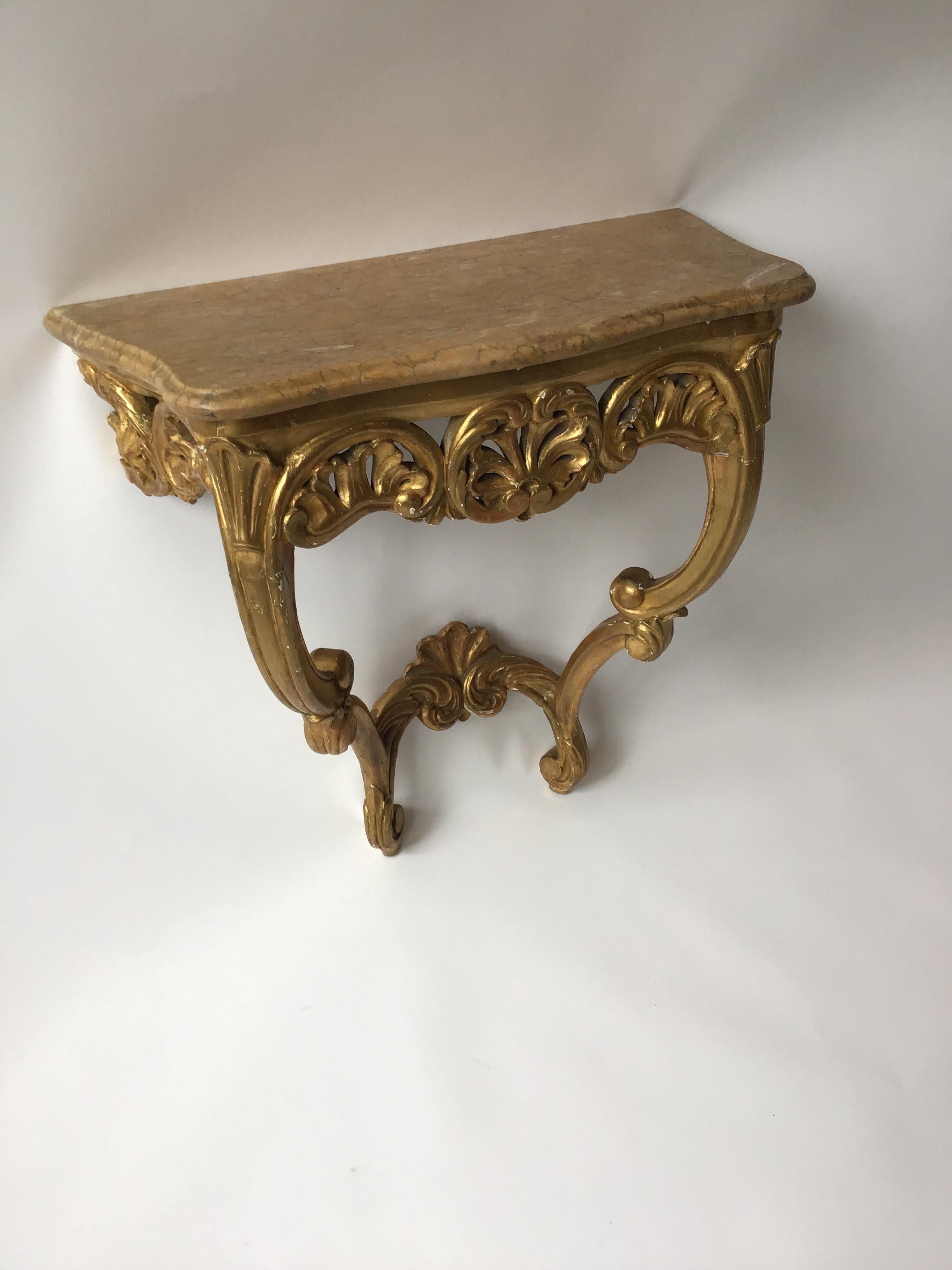 1870s French giltwood wall console with marble top.