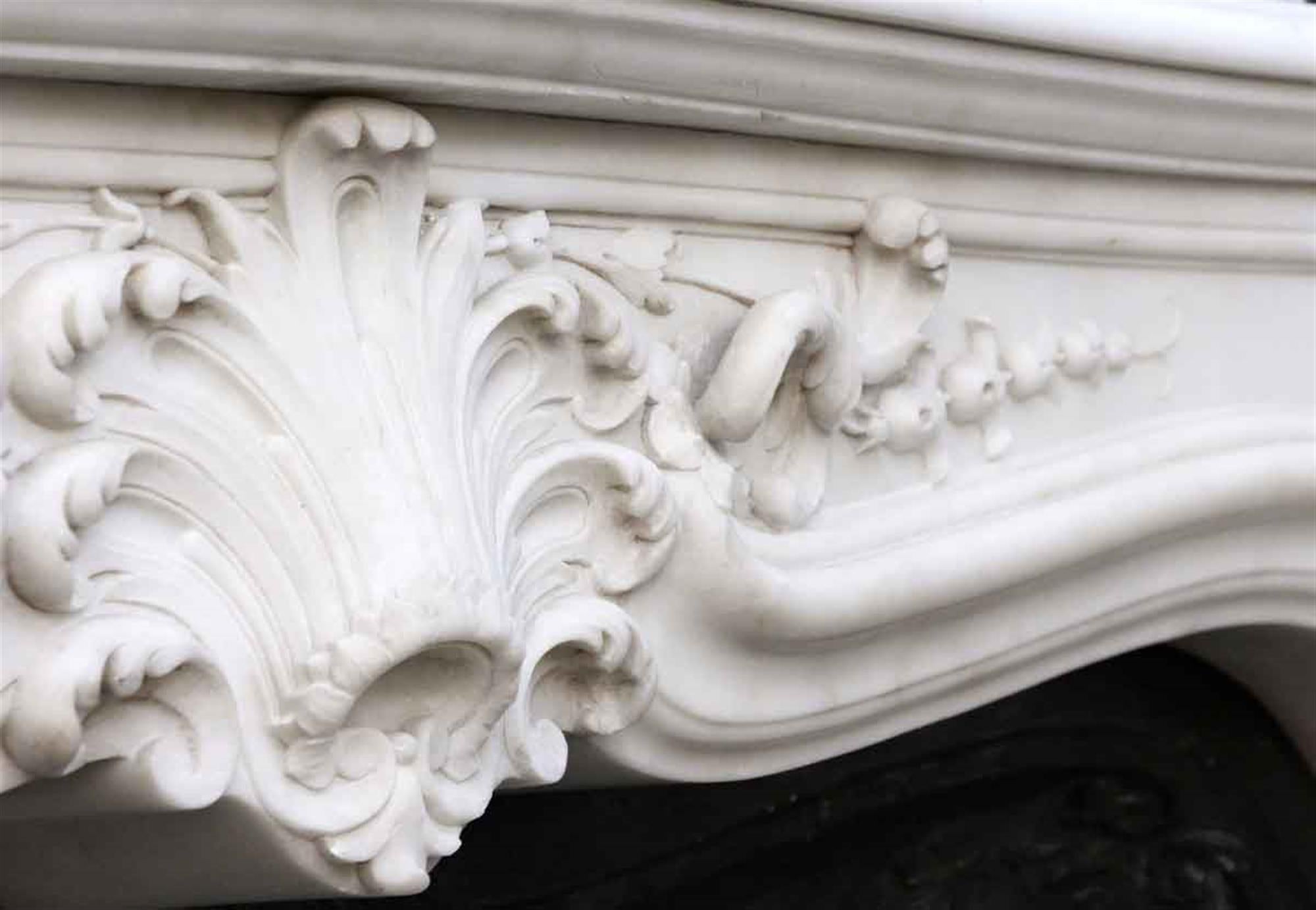 Hand-Carved 1870s French Heavily Hand Carved Marble Mantel with Cast Iron Insert