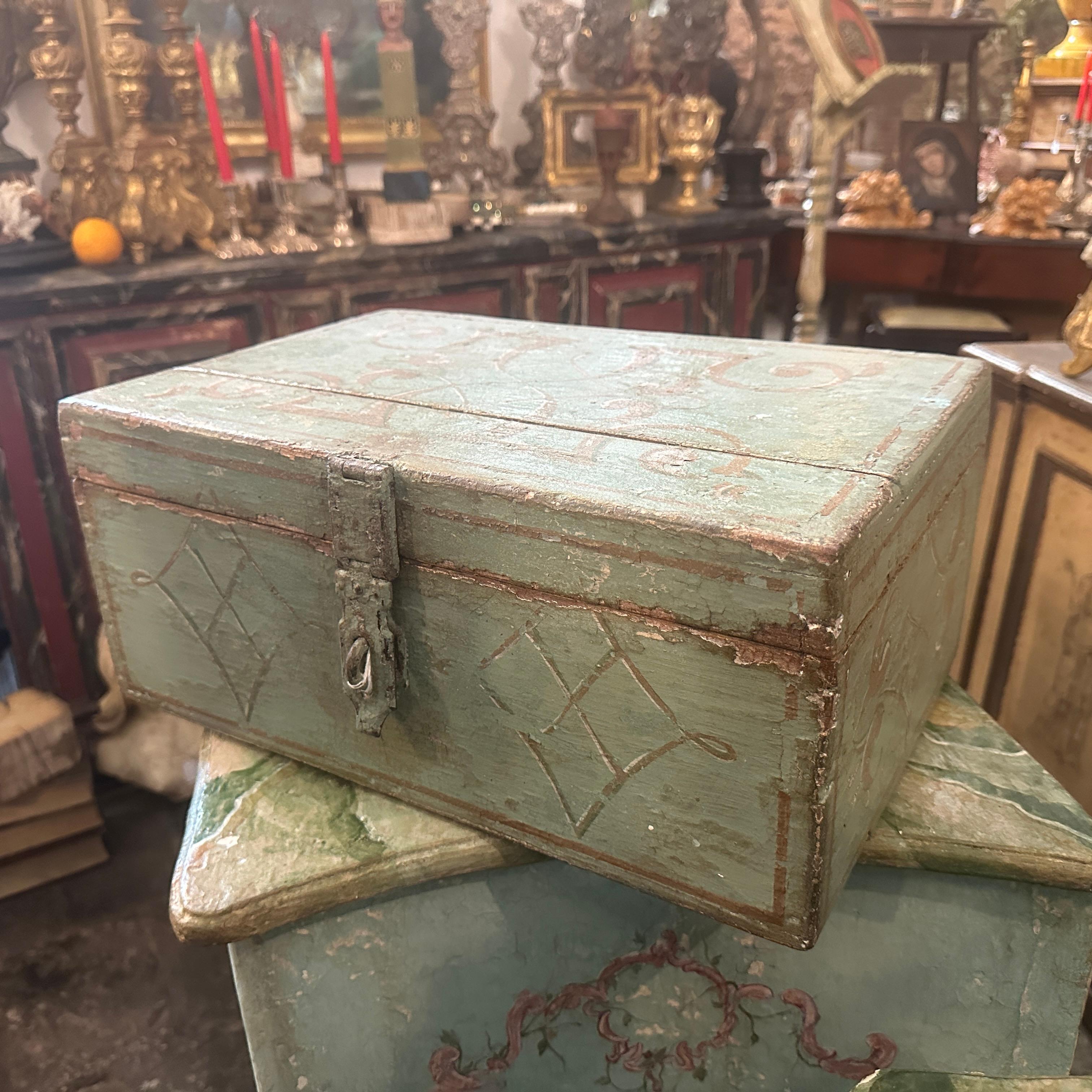 This lacquered wood Sicilian box is a unique and culturally rich artifact, combining elements of 19th-century design, regional influence, and artistic craftsmanship. The box is crafted from wood and features a lacquered finish. Lacquering is a