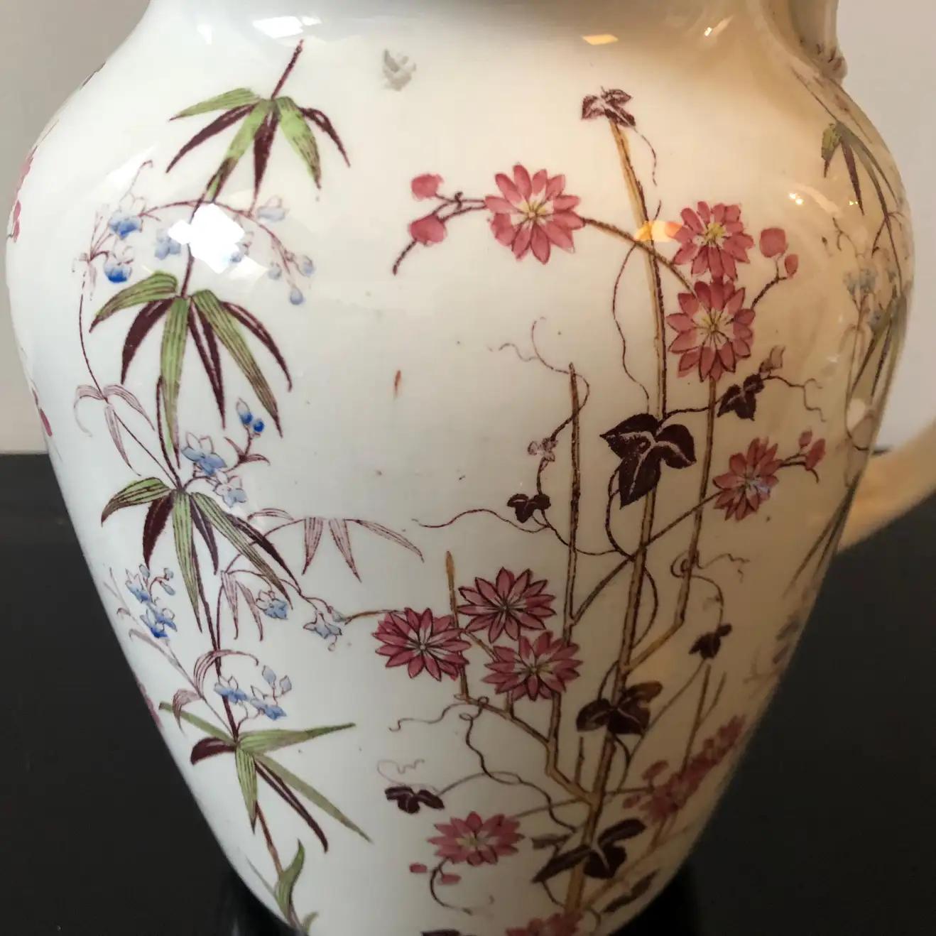 A ceramic jug with oriental decorations manufactured in Engladn in late 19th century. It's in perfect conditions.