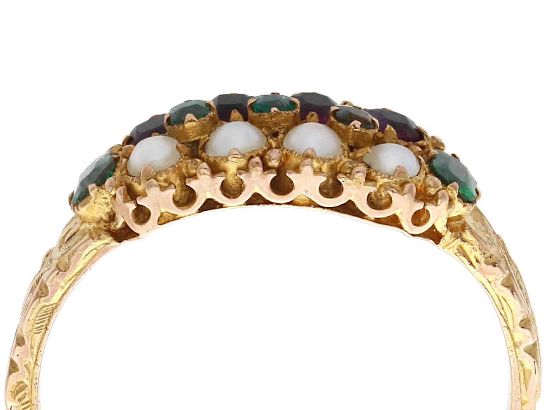 An impressive Victorian seed pearl and 0.13 carat emerald, 0.20 carat amethyst and 15 karat yellow gold dress ring; part of our diverse Victorian jewelry collections.

This fine and impressive antique Victorian ring has been crafted in 15k yellow