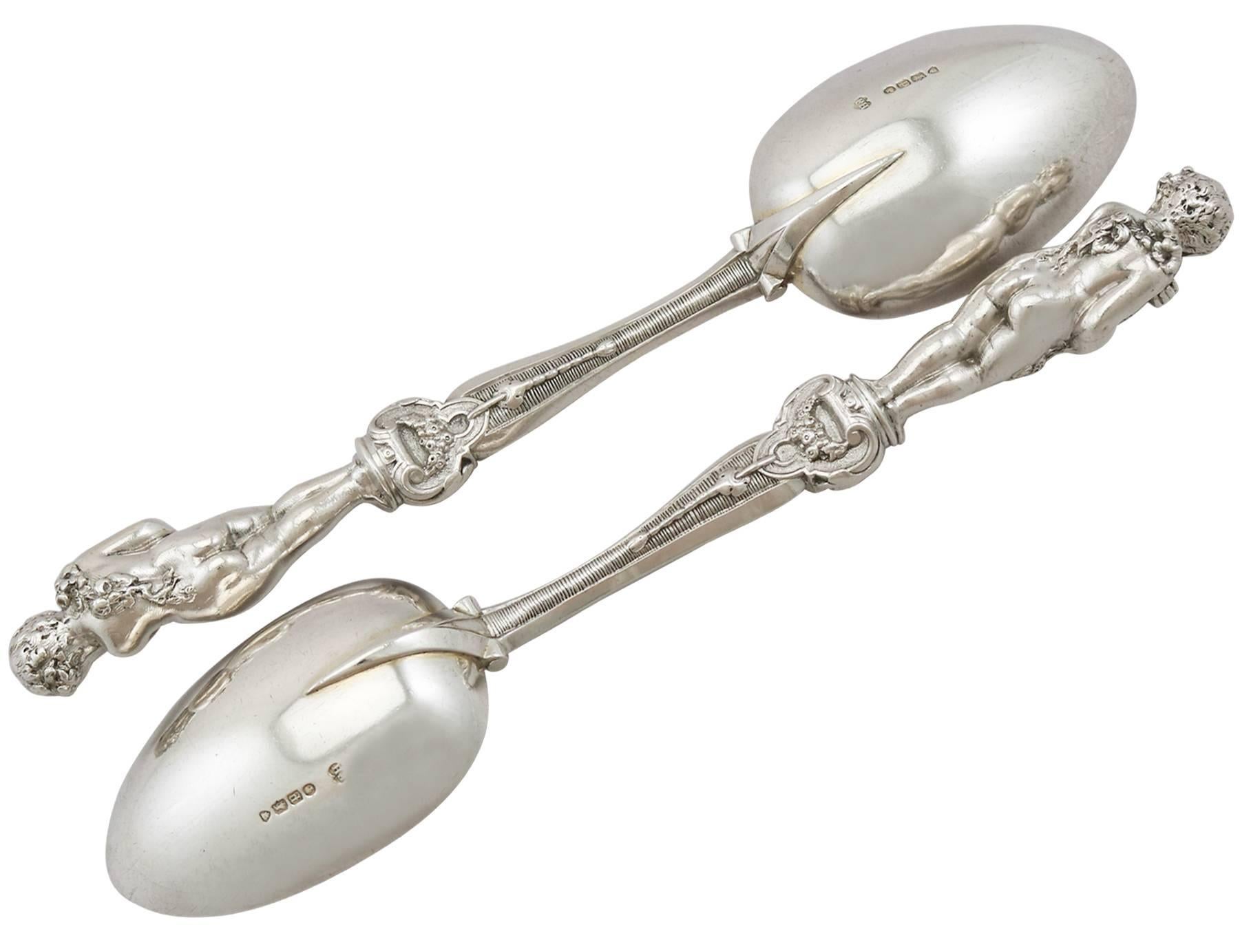 An exceptional, fine and impressive pair of antique Victorian English sterling silver serving spoons made by Francis Higgins II; an addition to our silver flatware collection

These exceptional antique Victorian English cast sterling silver
