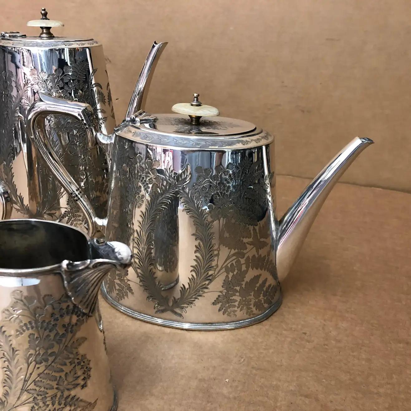 The Walker & Hall tea set is made of four pieces, nice engraving and good conditions overall. It's marked on the bottom.